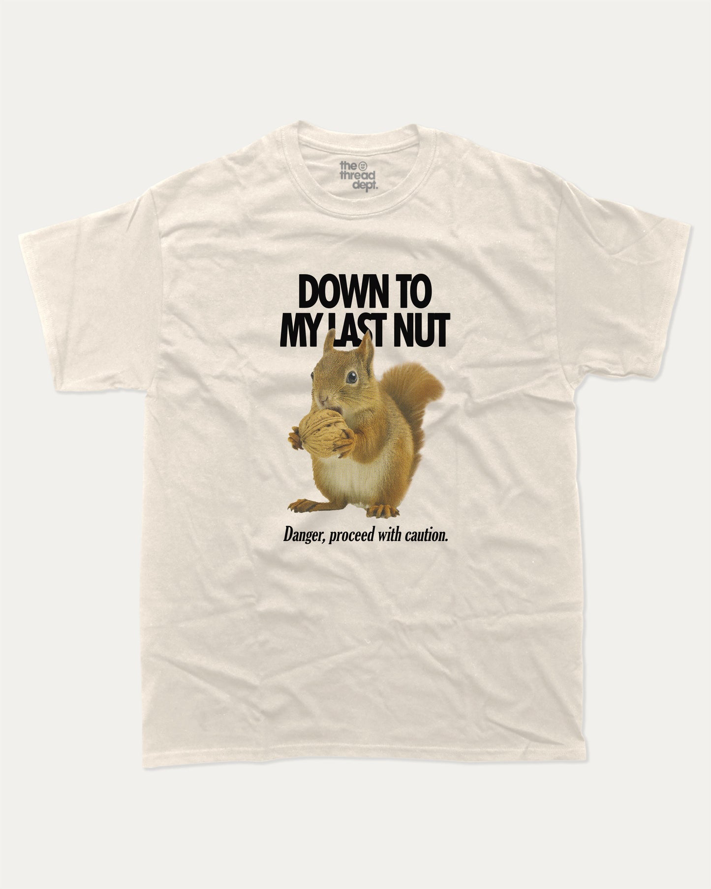 Down To My Last Nut graphic t-shirt, perfect for adults. Funny Animal Tee, Humorous Graphic T Shirt. Funny Graphic T Shirt, trending meme shirt, unique gift idea. Cream.
