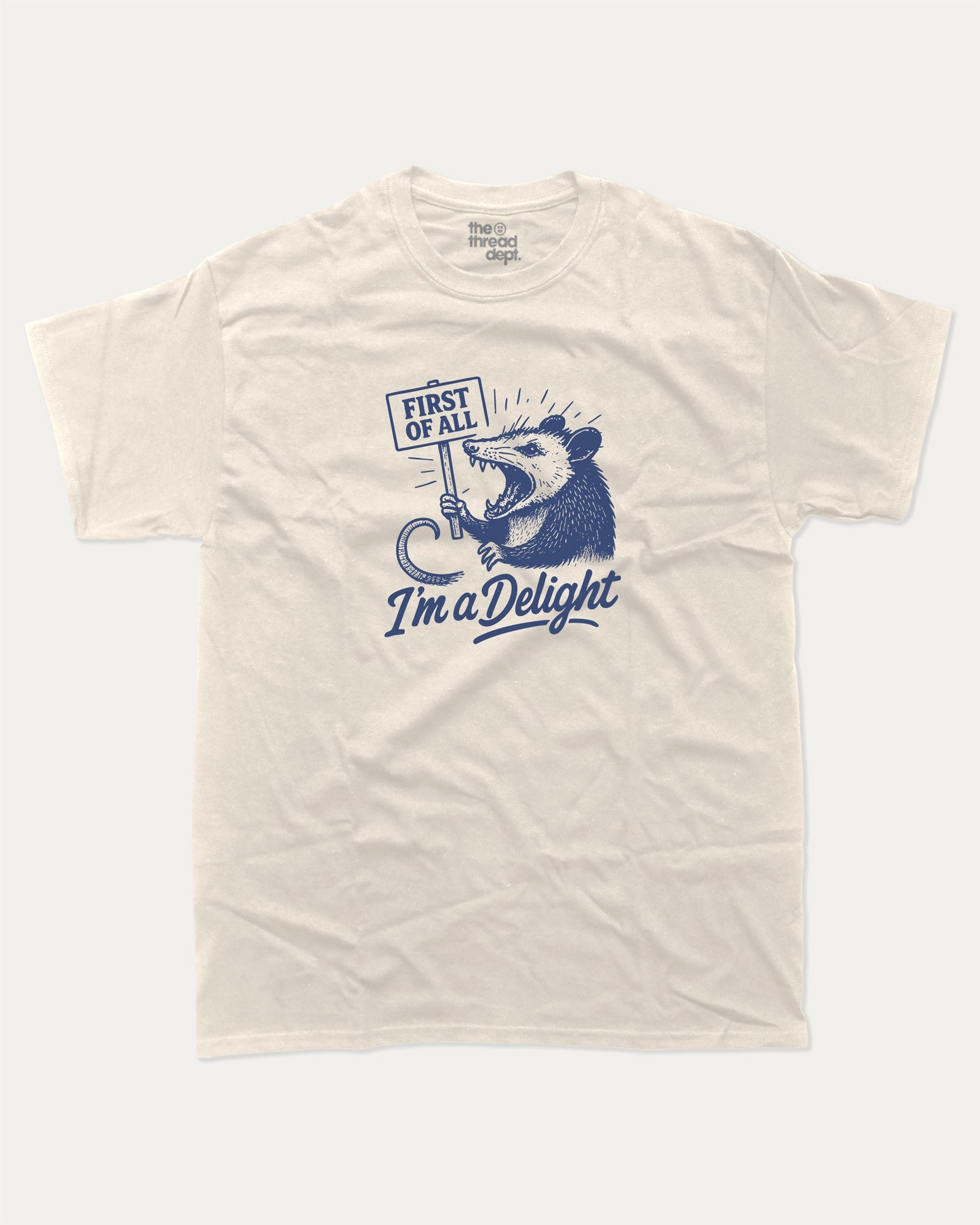 First Of All I'm A Delight Possum graphic t-shirt, perfect for Friends. A must-have funny animal tee, trending meme shirt, unique gift idea. Cream.