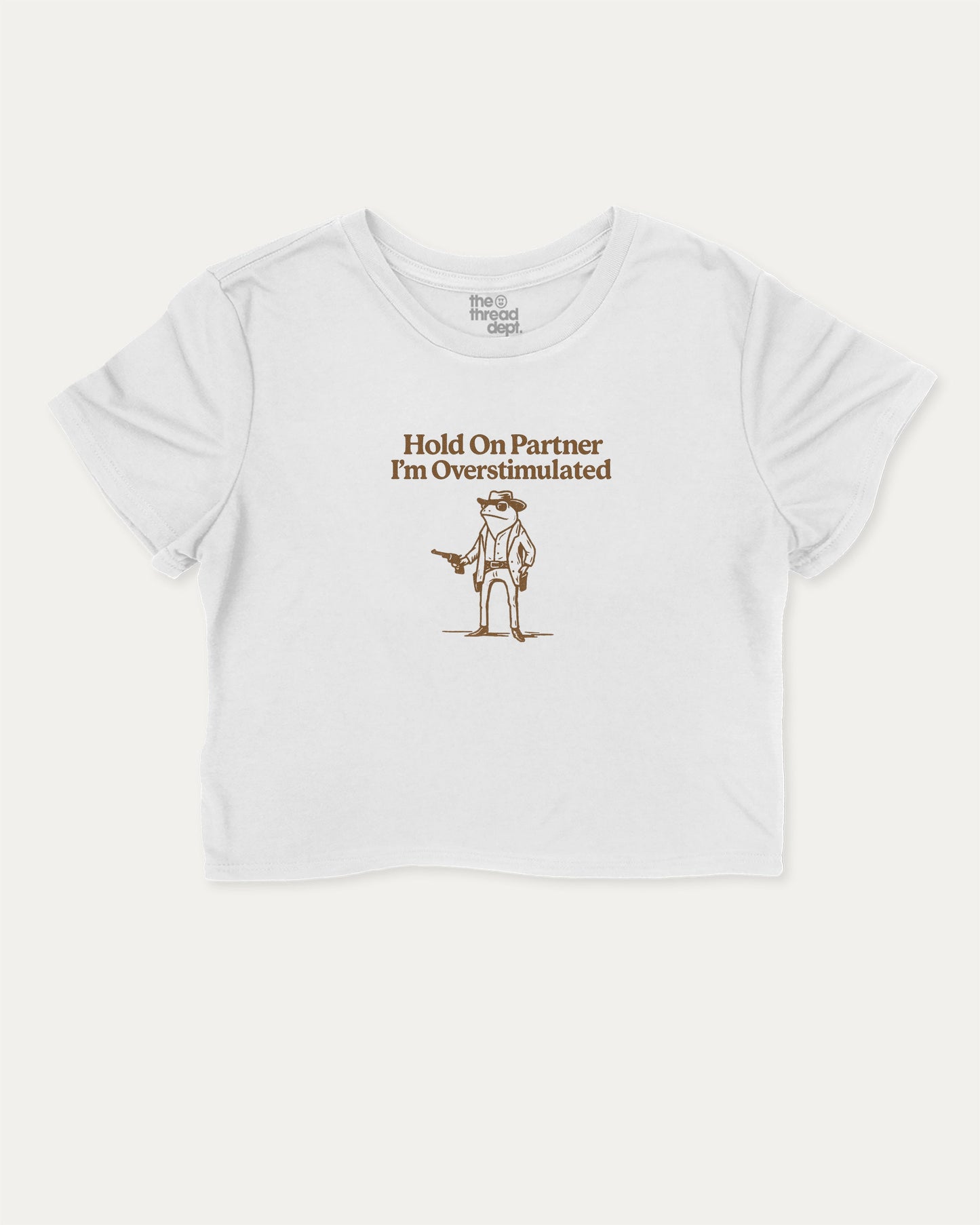 Hold On Partner I'm Overstimulated cute and trendy crop tee with nostalgic graphic, perfect for women. Funny Frogs crop t shirt, ideal for daily outfits and casual days. White crop tee