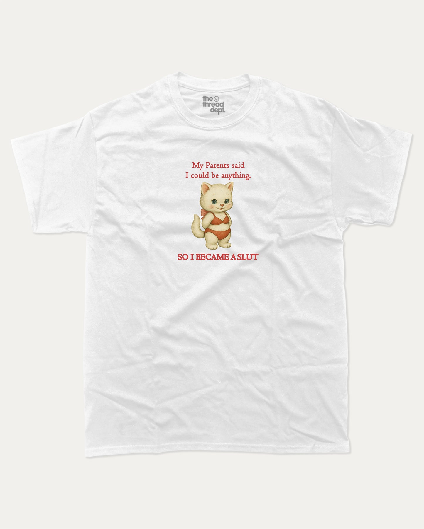 White t-shirt with a cartoon cat i became a slut graphic and text on a white background