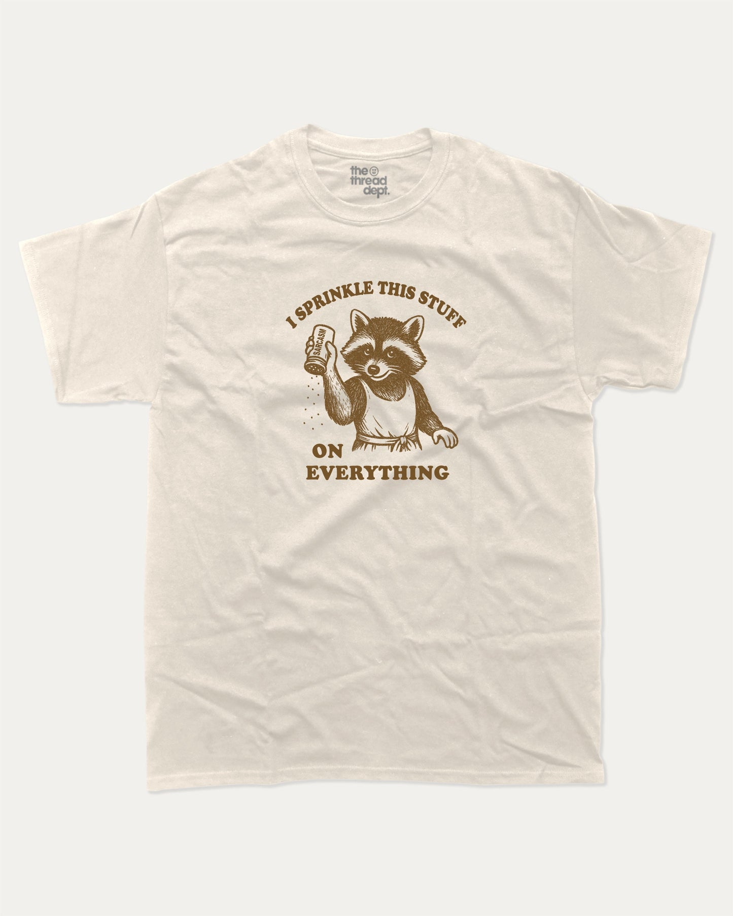 I Sprinkle This Stuff On Everything graphic t-shirt, perfect for adults. Funny Sarcasm tee, trending meme shirt, unique gift idea. Cream.