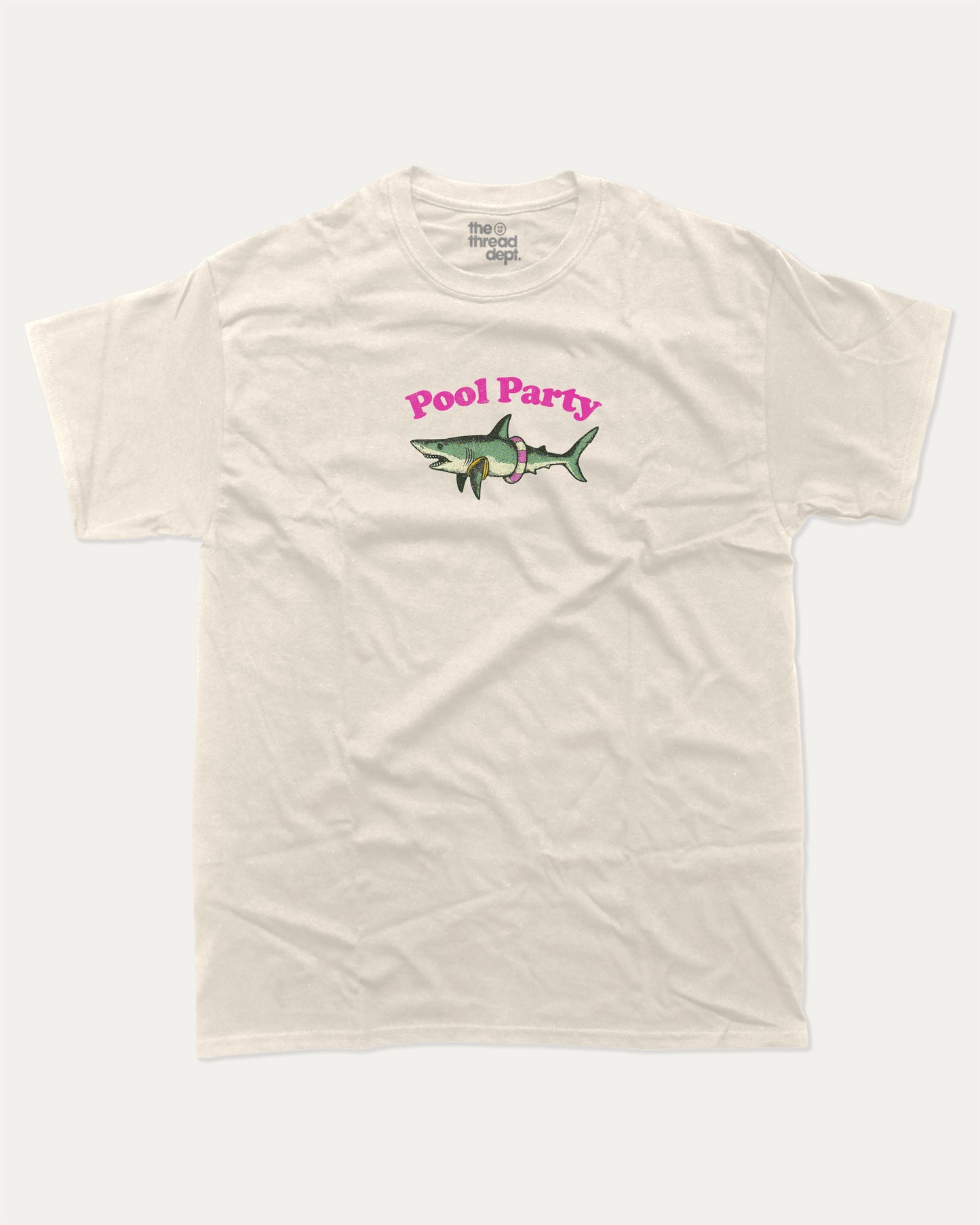 Pool Party graphic tee with bold and humorous print, Funny Shark Graphic Tee, Funny Animal Graphic T shirt, Perfect Gift for Shark Lover, Pun Graphic T shirt, funny and trendy graphic. Perfect for adults and gift-giving. Cream shirt.