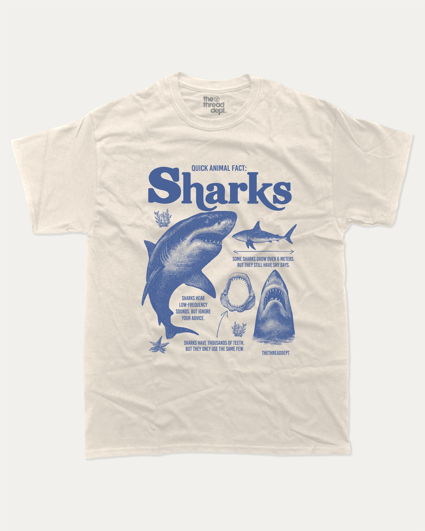 Quick Animal Fact Sharks graphic t-shirt, perfect for gifts. Vintage Sharks tee, Vintage ocean graphic shirt, unique gift idea. Cream.