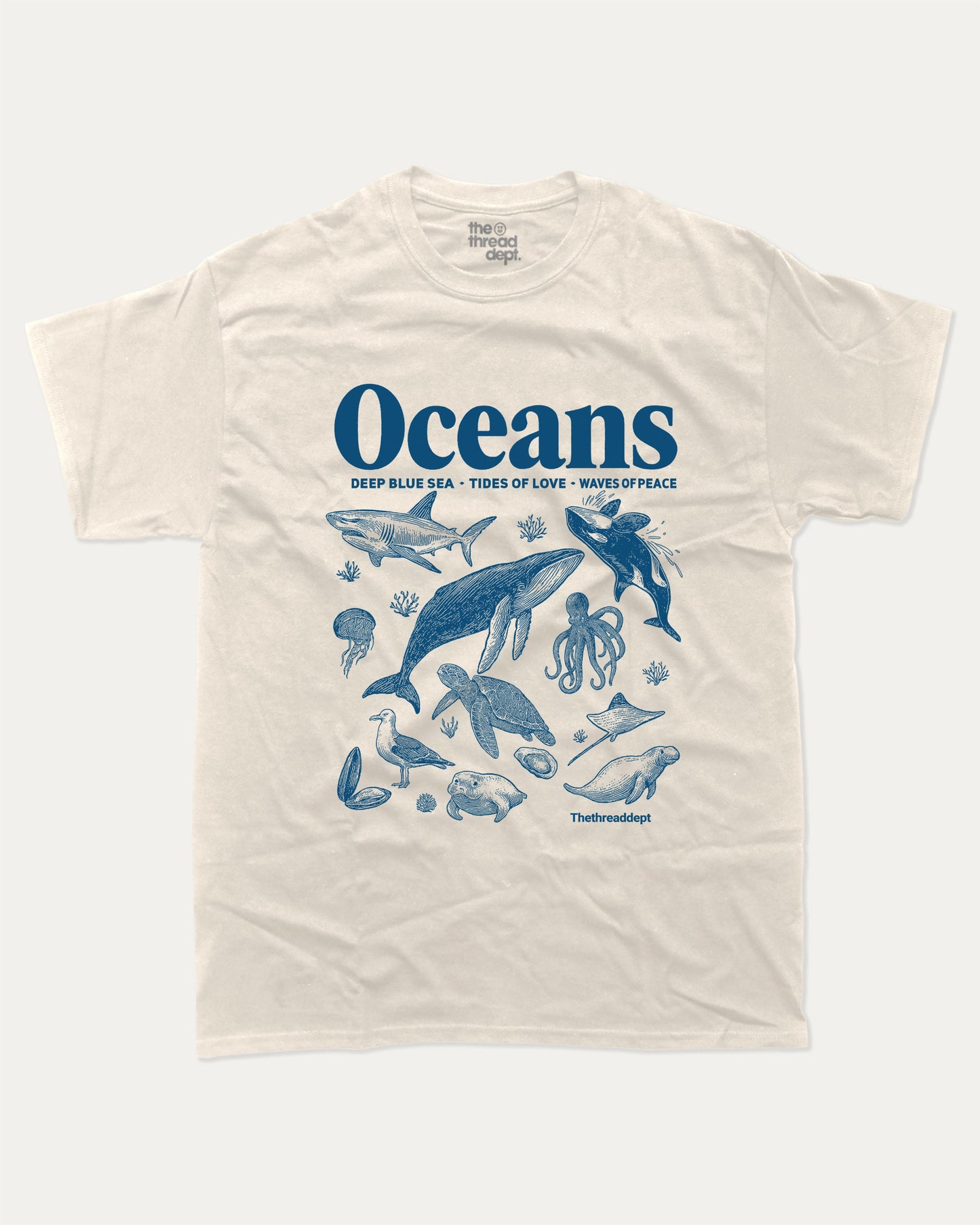 Retro Oceans graphic t-shirt, perfect for adults. A must-have sea animal tee, 90s vintage shirt, unique gift idea. Cream.
