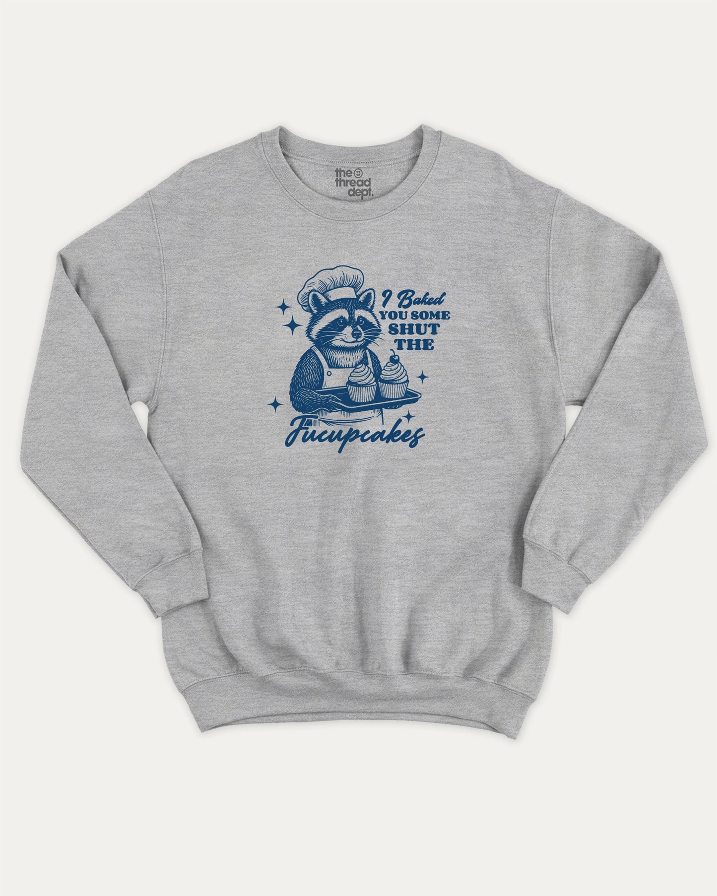 Shut The Fucupcakes Racoon pullover sweatshirt, Funny Animal Graphic T shirt, Humorous Animal T shirt, Cute Animal Graphic T shirt, A must-have graphic pullover, comfy cold-weather wear, bold casual look. Heather Grey sweater