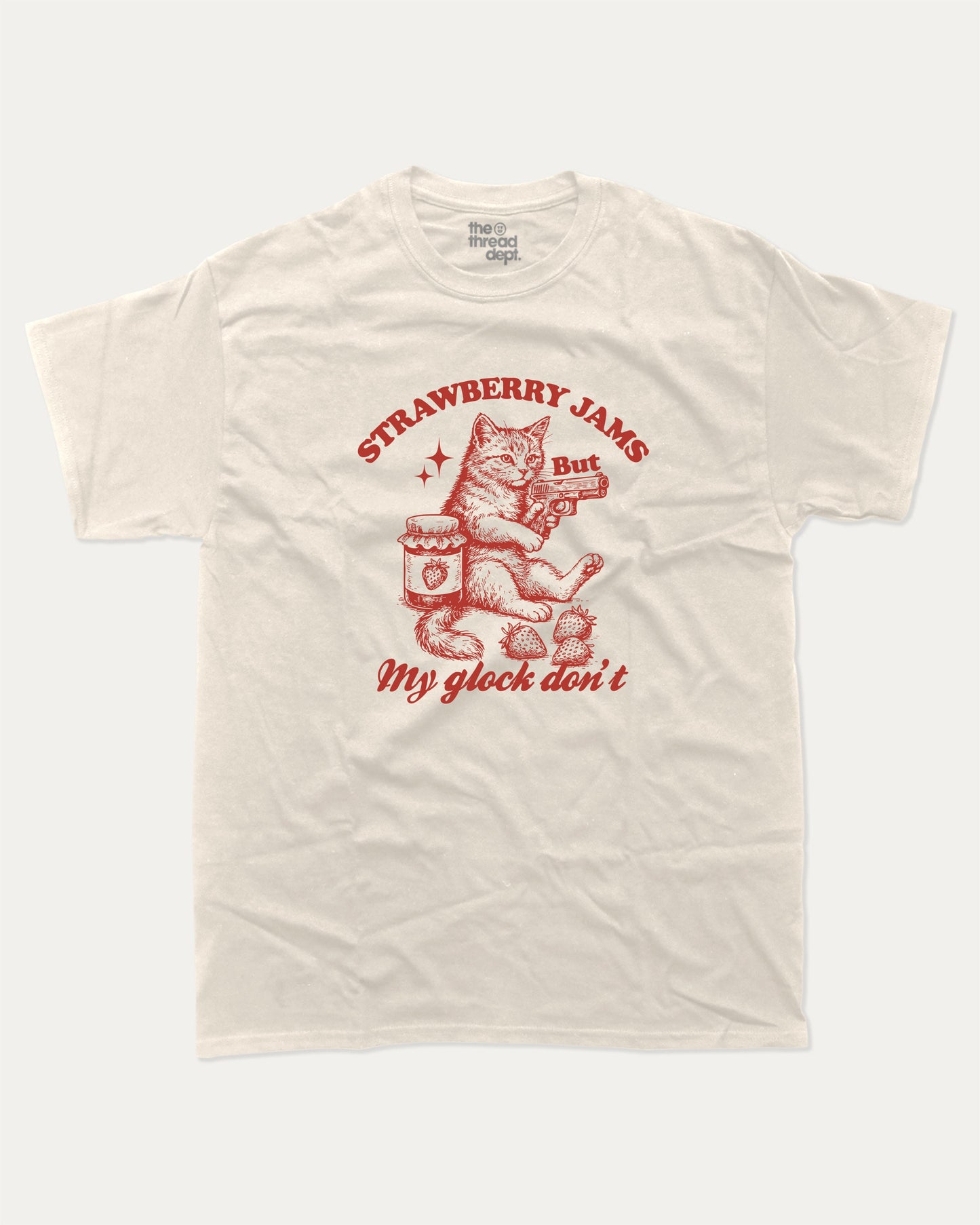Strawberry Jams graphic tee with bold and humorous print, funny and trendy Animal Lover Graphic T shirt, Cat Lover Tee, Retro Animal Graphic T shirt, Retro Cat Graphic T shirt, Perfect for adults and gift-giving. Cream shirt.