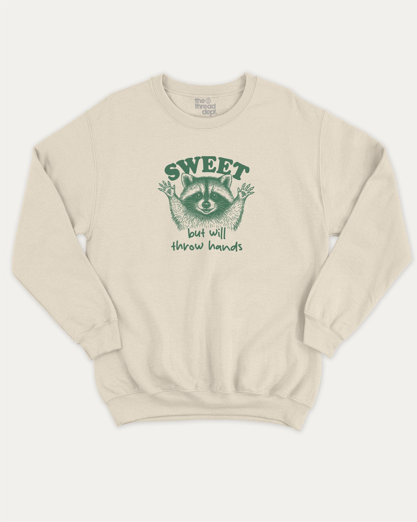 Sweet But Will Throw Hands Raccoon pullover sweatshirt, perfect for adults. Funny raccoon graphic pullover, comfy cold-weather wear, bold casual look. Natural sweater