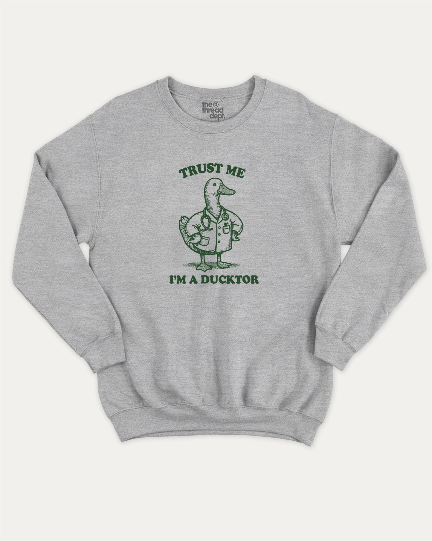 Trust Me I'm A Ducktor pullover sweatshirt, perfect for gifts. A must-have duck graphic pullover, comfy cold-weather wear, bold casual look. Heather Grey sweater