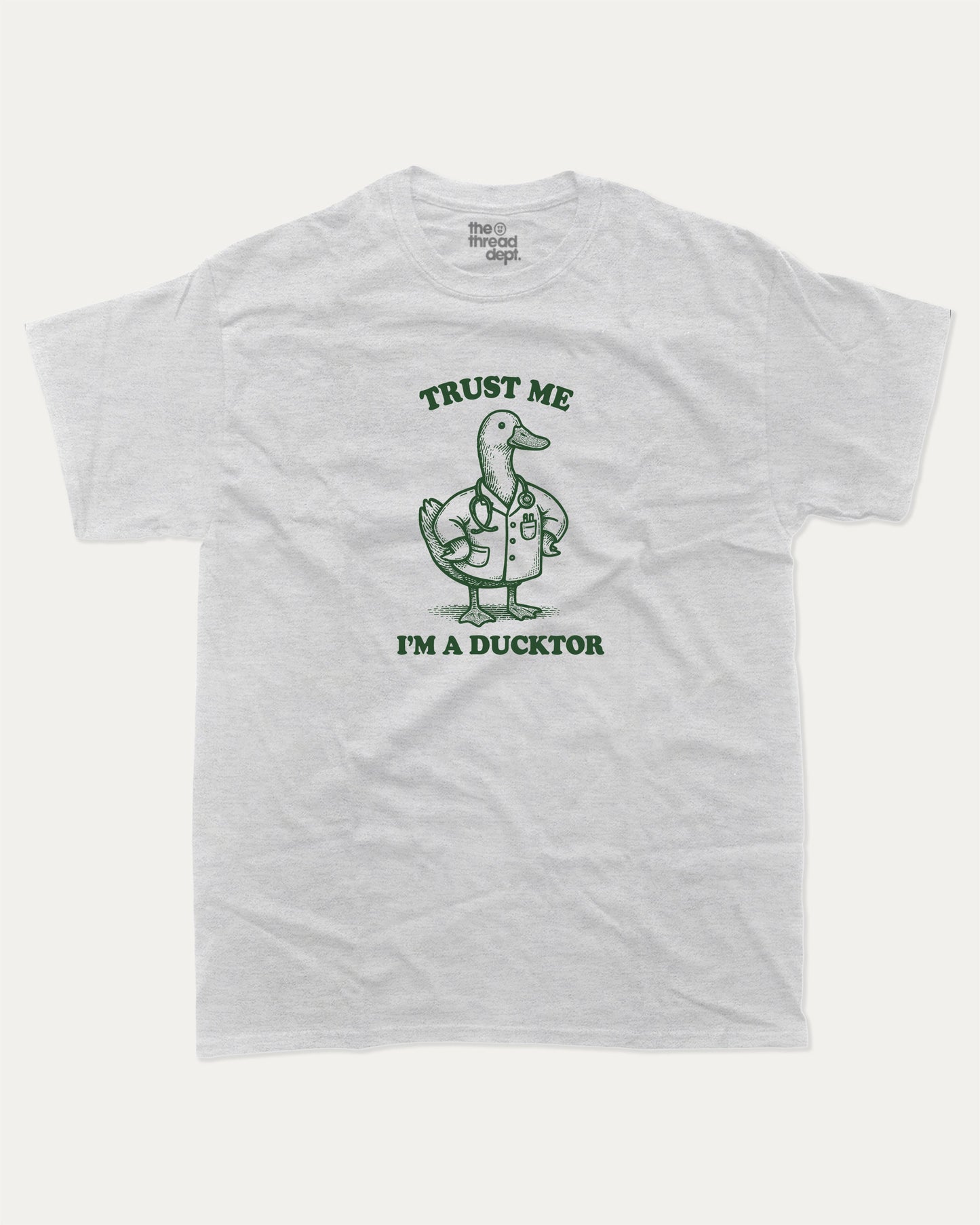 Trust Me I'm A Ducktor graphic t-shirt, perfect for gifts. Funny duck graphic tee, trending meme shirt, unique gift idea. Ash Grey .