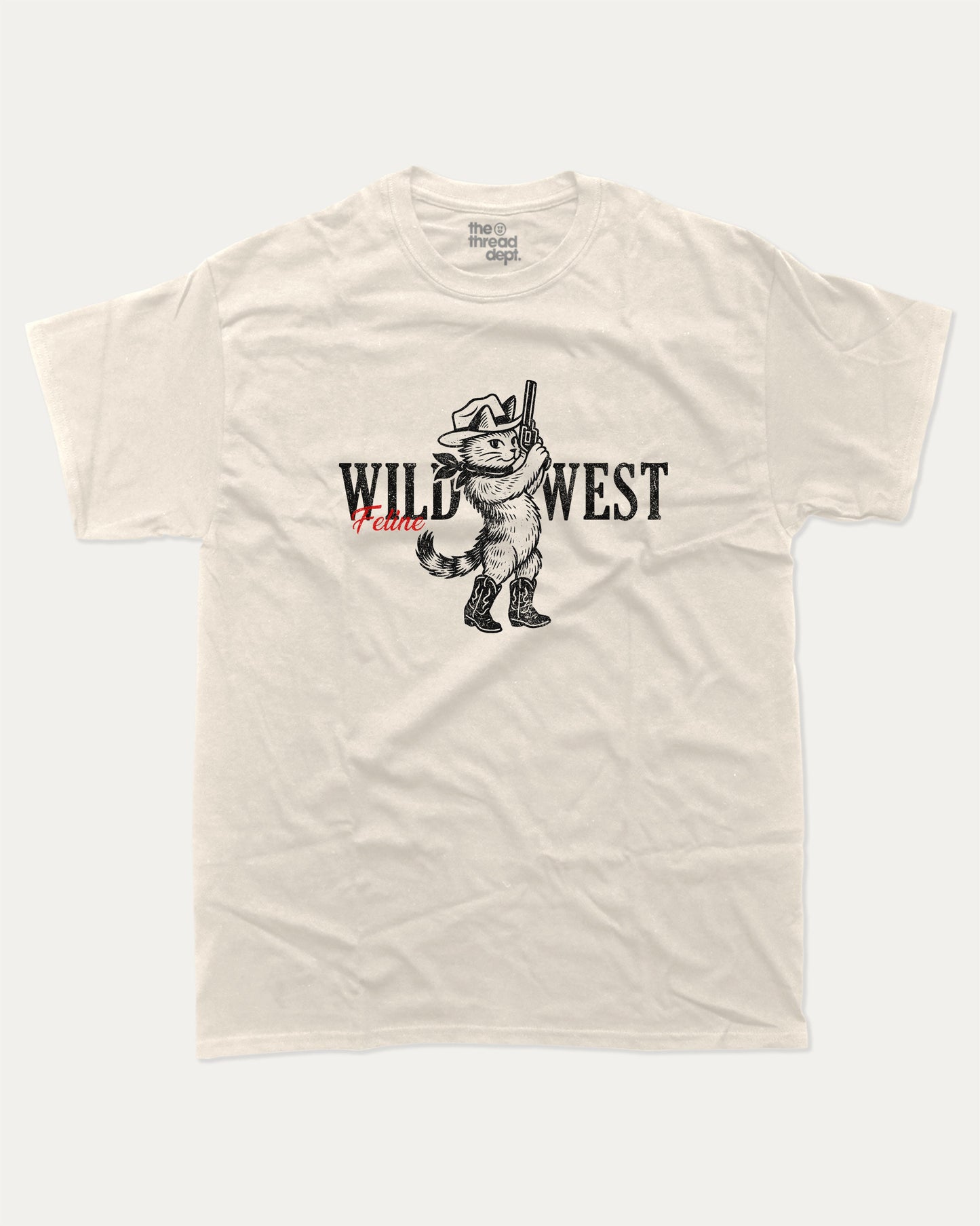 Wild West Feline graphic t-shirt, Vintage-style animal graphic T-shirt featuring playful dog and cat illustrations, Cute cartoon animals printed on retro aesthetic T-shirt design. A must-have funny tee, trending meme shirt, unique gift idea. Cream.
