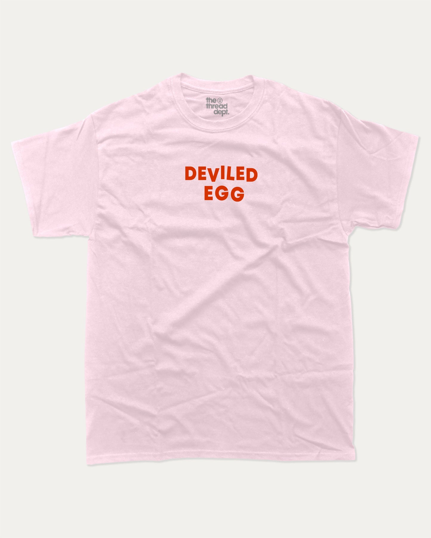 Deviled Egg graphic tee with bold and humorous print, funny and trendy graphic. Food Lover T shirt, Craving Graphic Tee, Perfect for adults and gift-giving. Pink shirt.