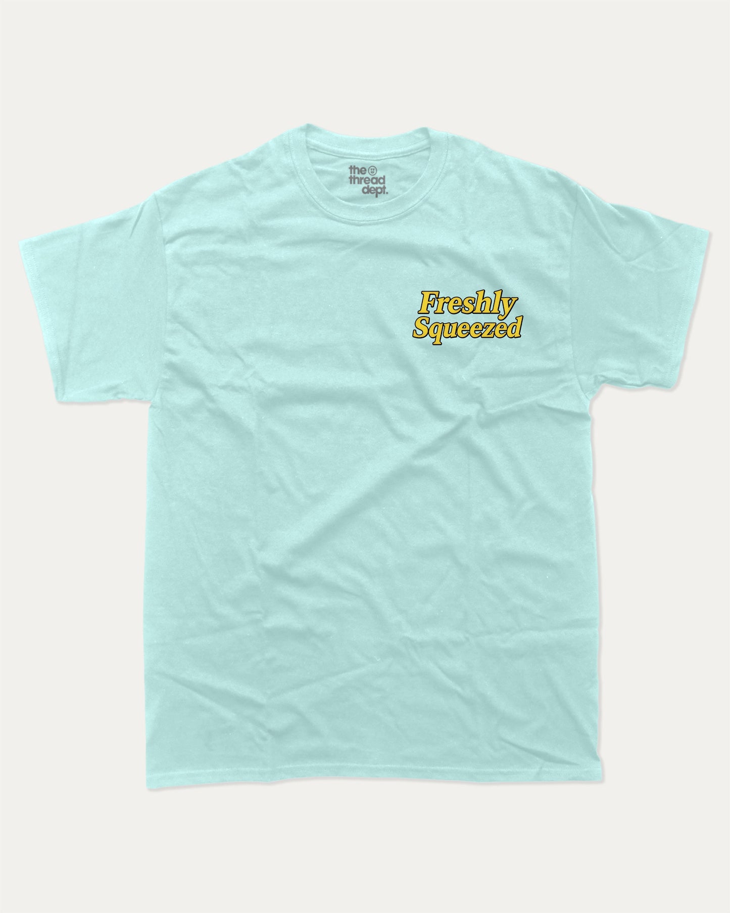 Freshly Squeezed Lemon graphic t-shirt, perfect for adults. Vintage lemon graphic tee, trending meme shirt, unique gift idea. Celadon.