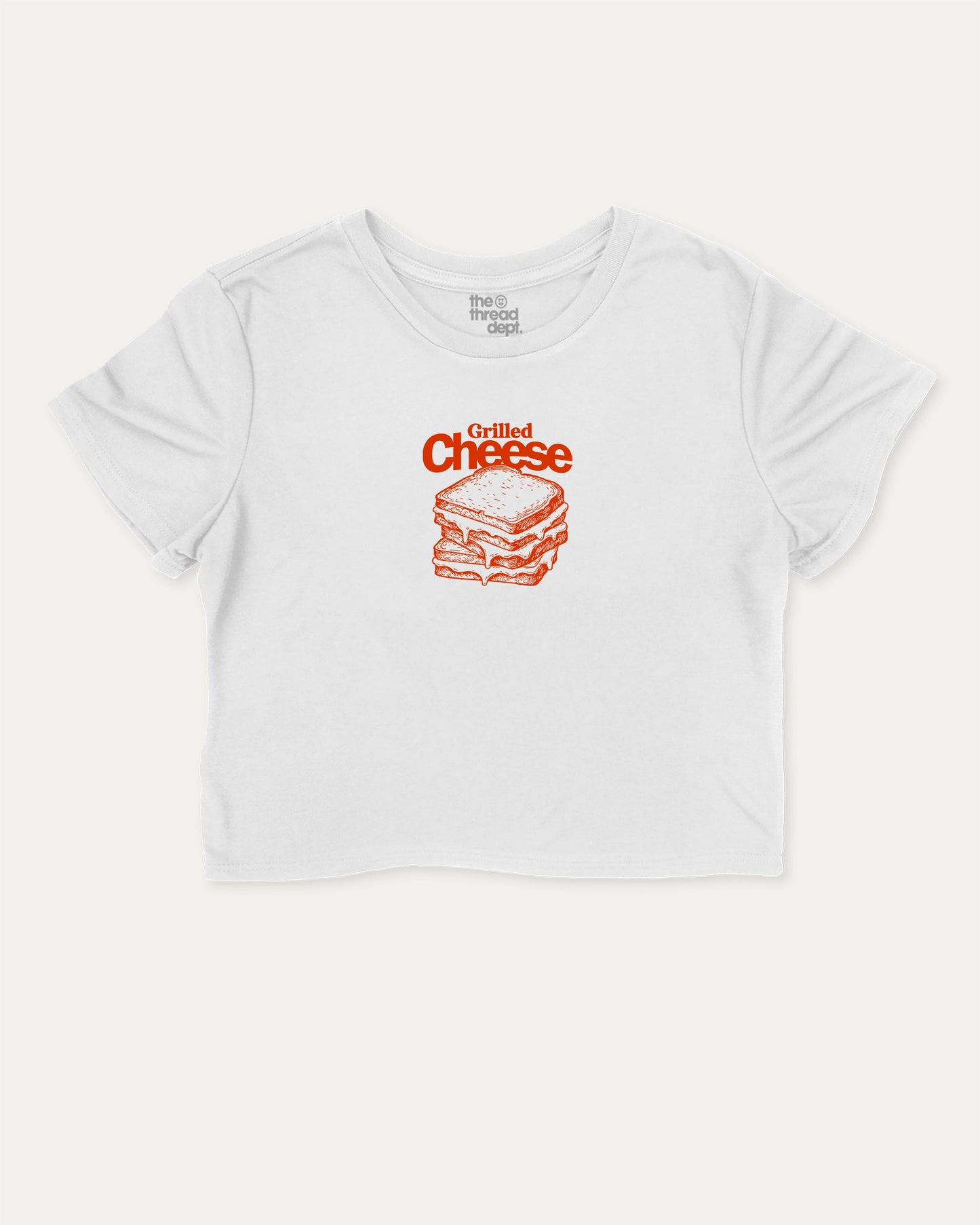 Grilled Cheese graphic crop tee with funny and trendy slogan print, perfect for women’s casual looks or layering. White crop t-shirt.