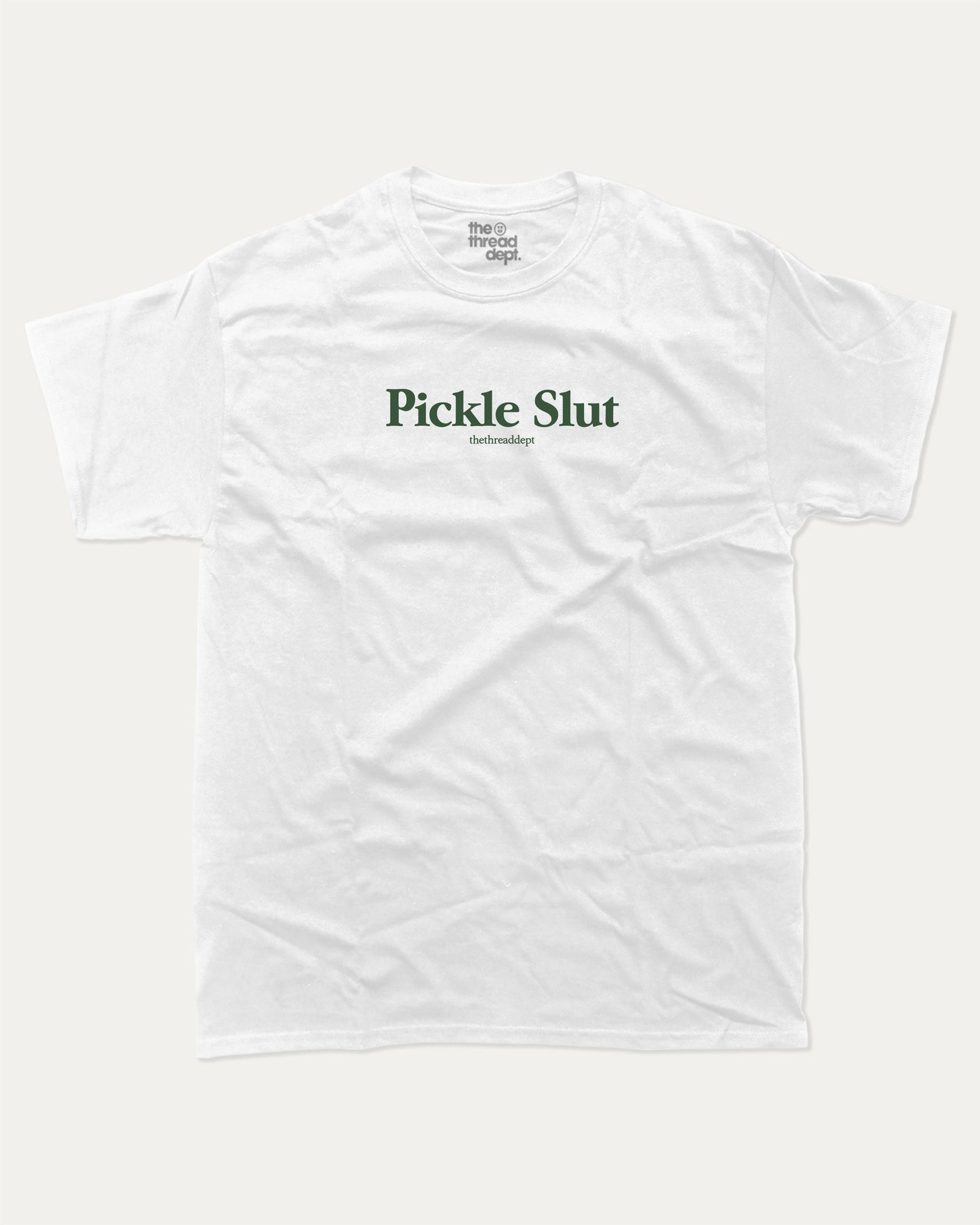 Pickle Slut graphic tee with bold and humorous print, funny and trendy graphic. Perfect Gift for Food Lover, Pickle Graphic T shirt, Craving Graphic T shirt, Snack Graphic T shirt, Perfect for adults and gift-giving. White shirt.