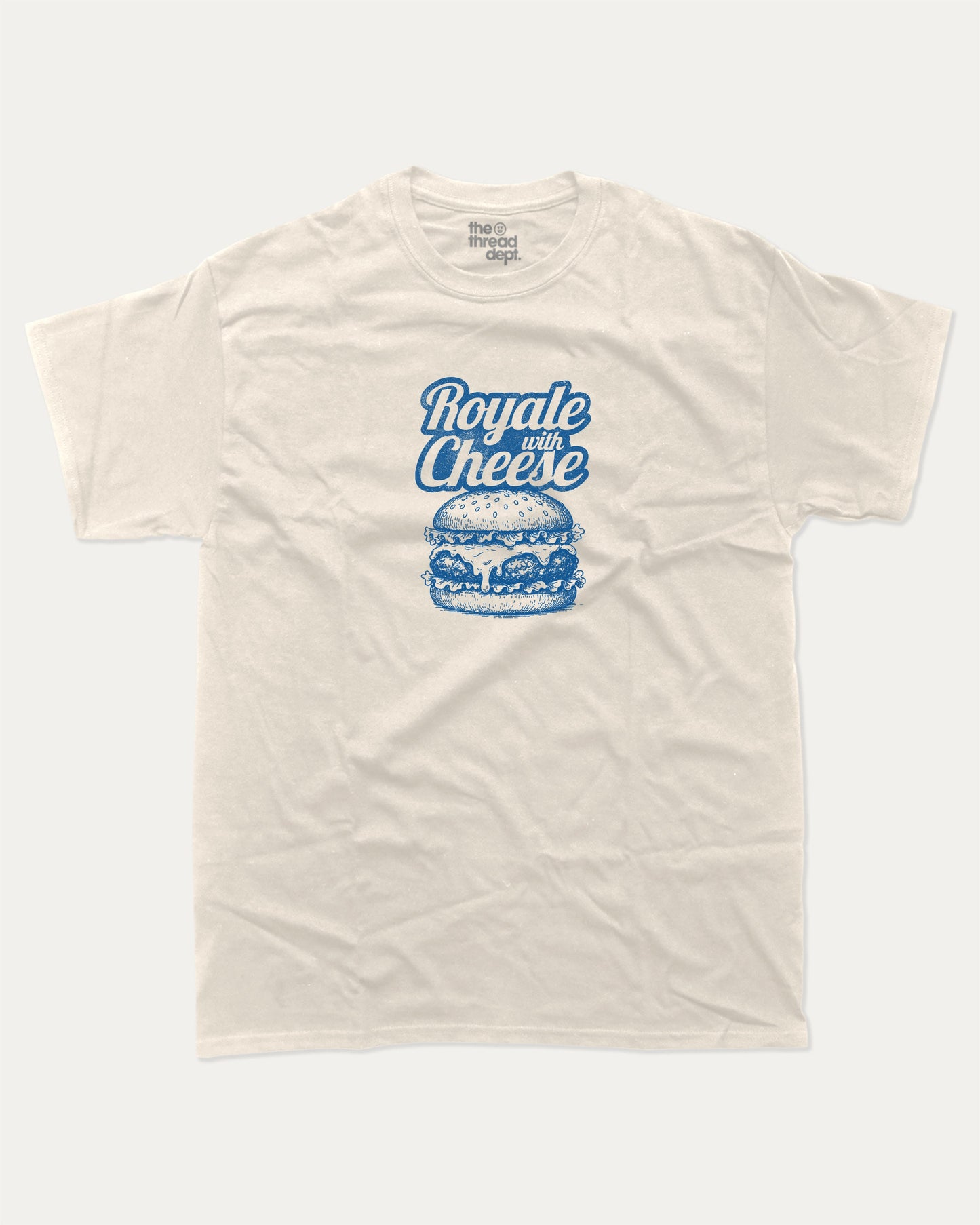Royale with Cheese graphic tee with bold and humorous print, funny and trendy graphic. Perfect Gift for Food Lover, Cheese Burger Graphic T shirt, Craving Graphic T shirt, Snack Graphic T shirt, Perfect for adults and gift-giving. Cream shirt.