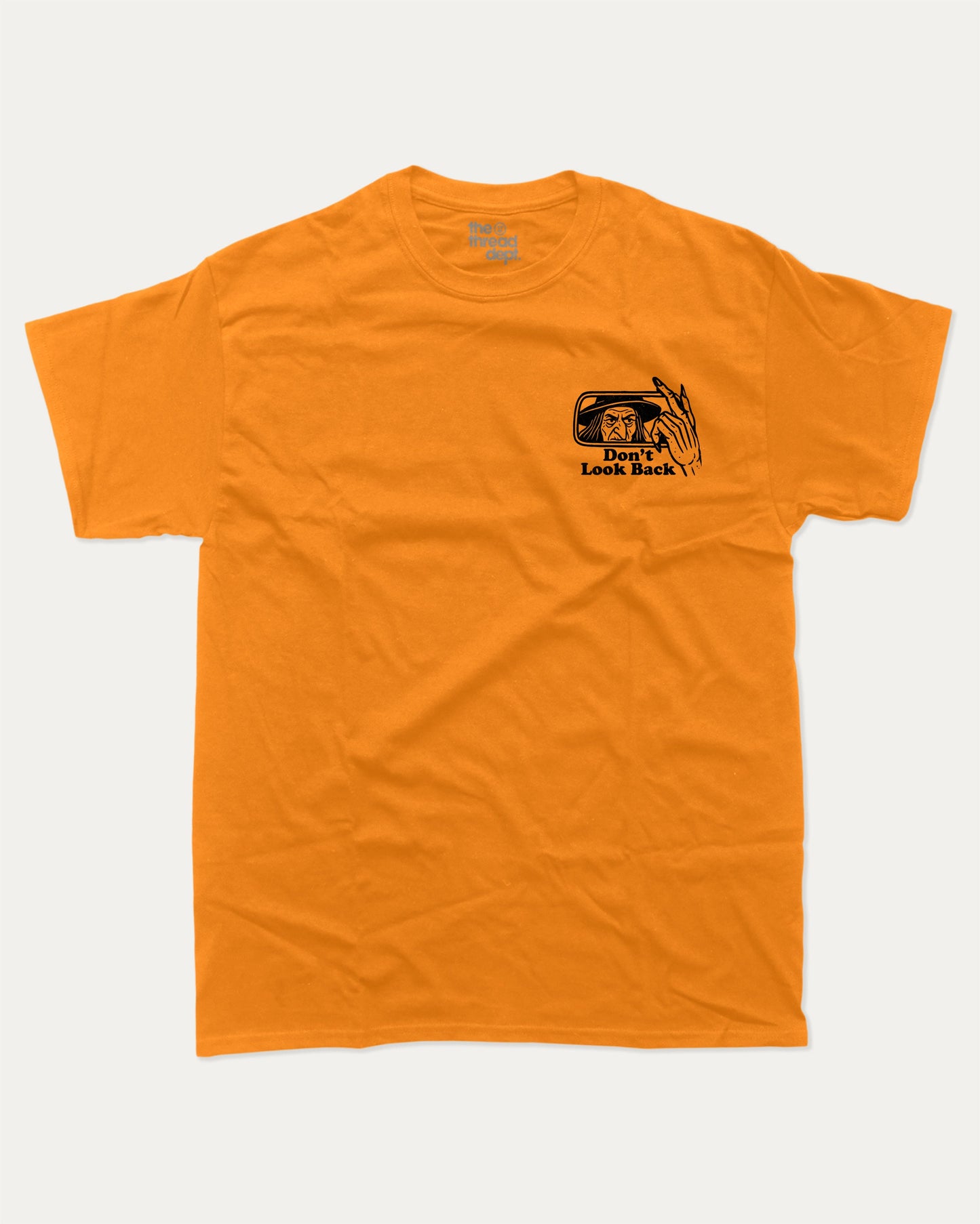 Don't Look Back graphic tee with bold and humorous print, funny and trendy graphic. Perfect gift for Halloween day, Halloween Graphic T shirt, Celebrating Halloween Tee, Perfect for adults and gift-giving. Orange shirt.