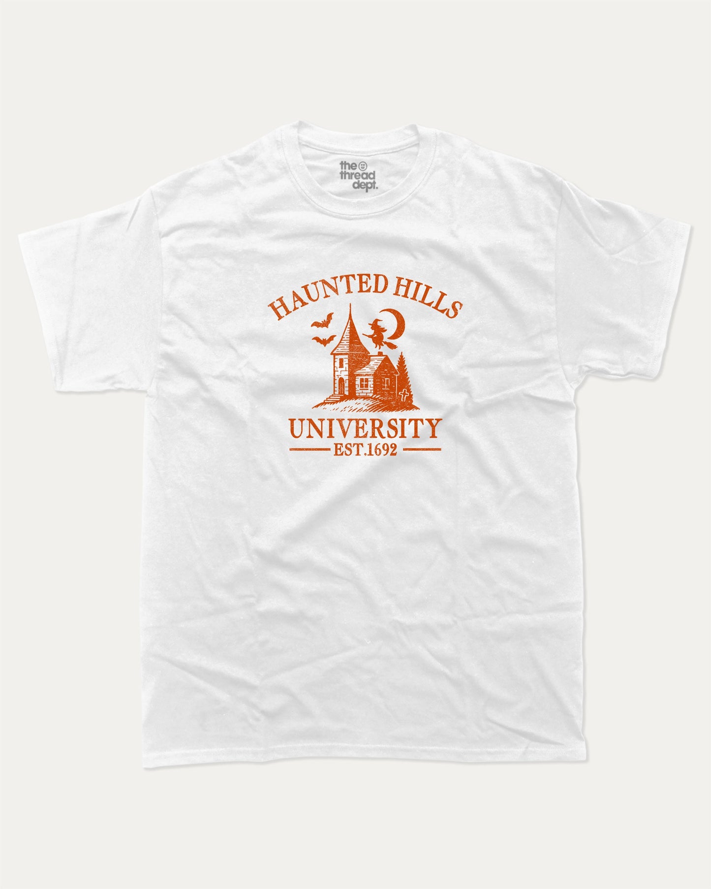 Haunted Hills University graphic tee with bold and humorous print, Halloween Graphic T shirt, Spooky T shirt, Perfect Gift for Halloween Day, funny and trendy graphic. Perfect for adults and gift-giving. White shirt.