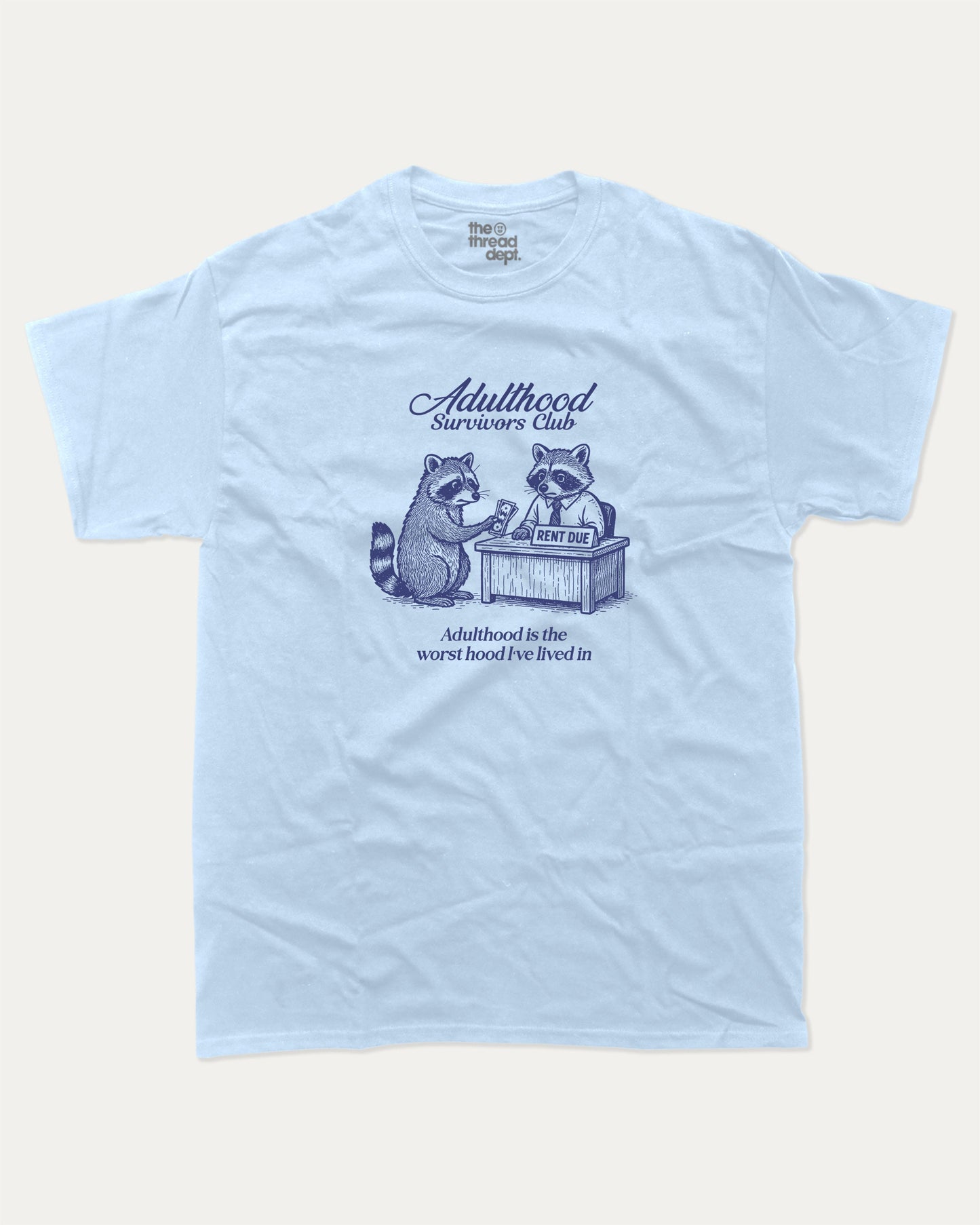 Adulthood Survivors Club graphic t-shirt, perfect for adults. Vintage Retro T shirt, Funny Racoon T shirt, Cute Racoon T shirt, Vintage Graphic Tee, unique gift idea. Powder Blue.