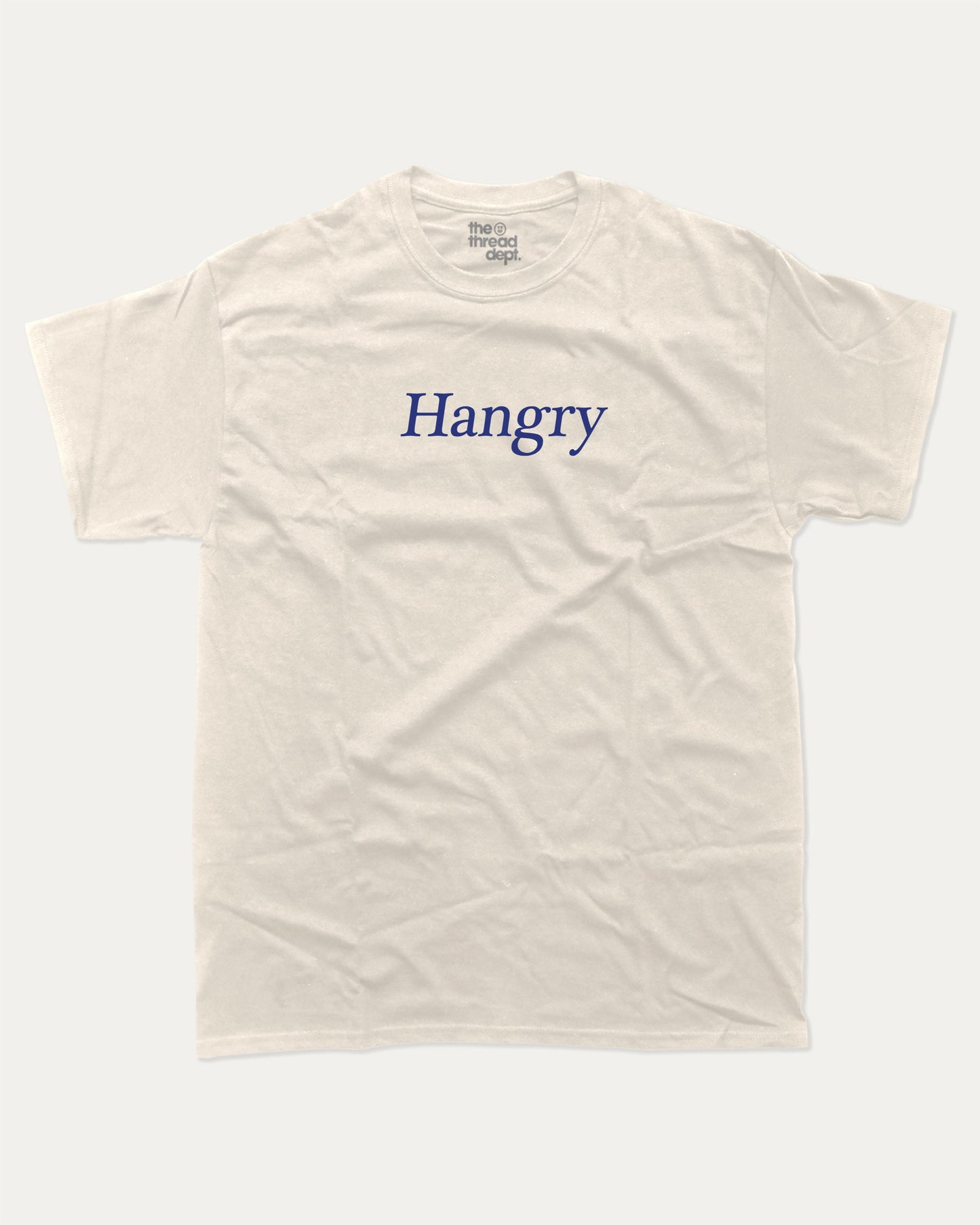 Hangry graphic tee with bold and humorous print, funny and trendy graphic. Perfect for adults and gift-giving. Cream shirt.