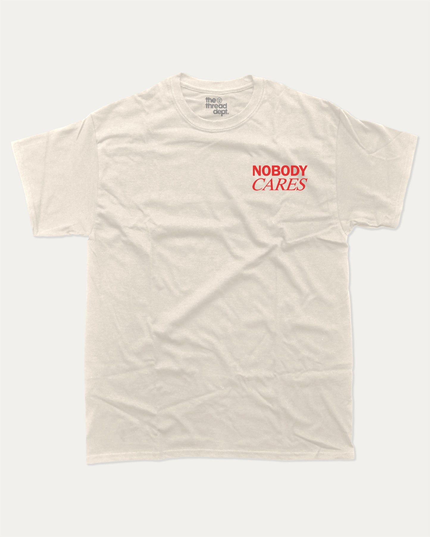 Nobdy Cares graphic t-shirt, perfect for adults. A must-have funny tee, Funny Graphic Tee. Humorous Text T shirt, Trending meme shirt,, unique gift idea. Cream.