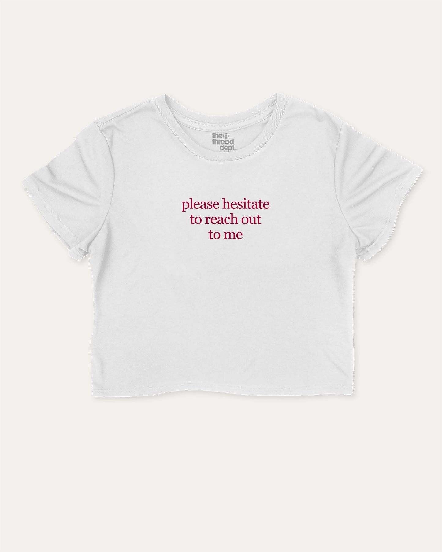 Please Hesitate To Reach Out To Me cute and trendy crop tee with nostalgic graphic, perfect for women. A must-have cropped aesthetic shirt, ideal for daily outfits and casual days. White crop tee