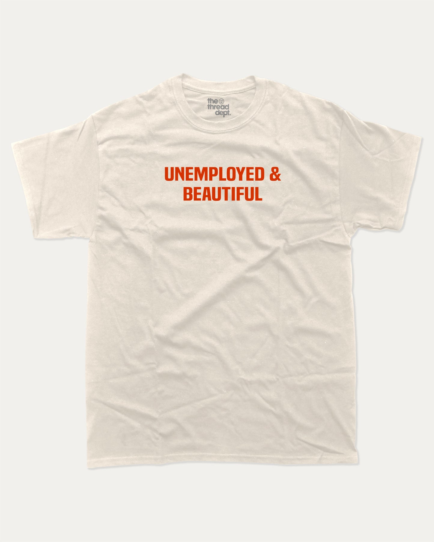 Unemployed and Beautiful graphic t-shirt, Pun Graphic T shirt, Funny Words T shirt, Humorous Graphic T shirt, A must-have funny tee, trending meme shirt, unique gift idea. Cream.