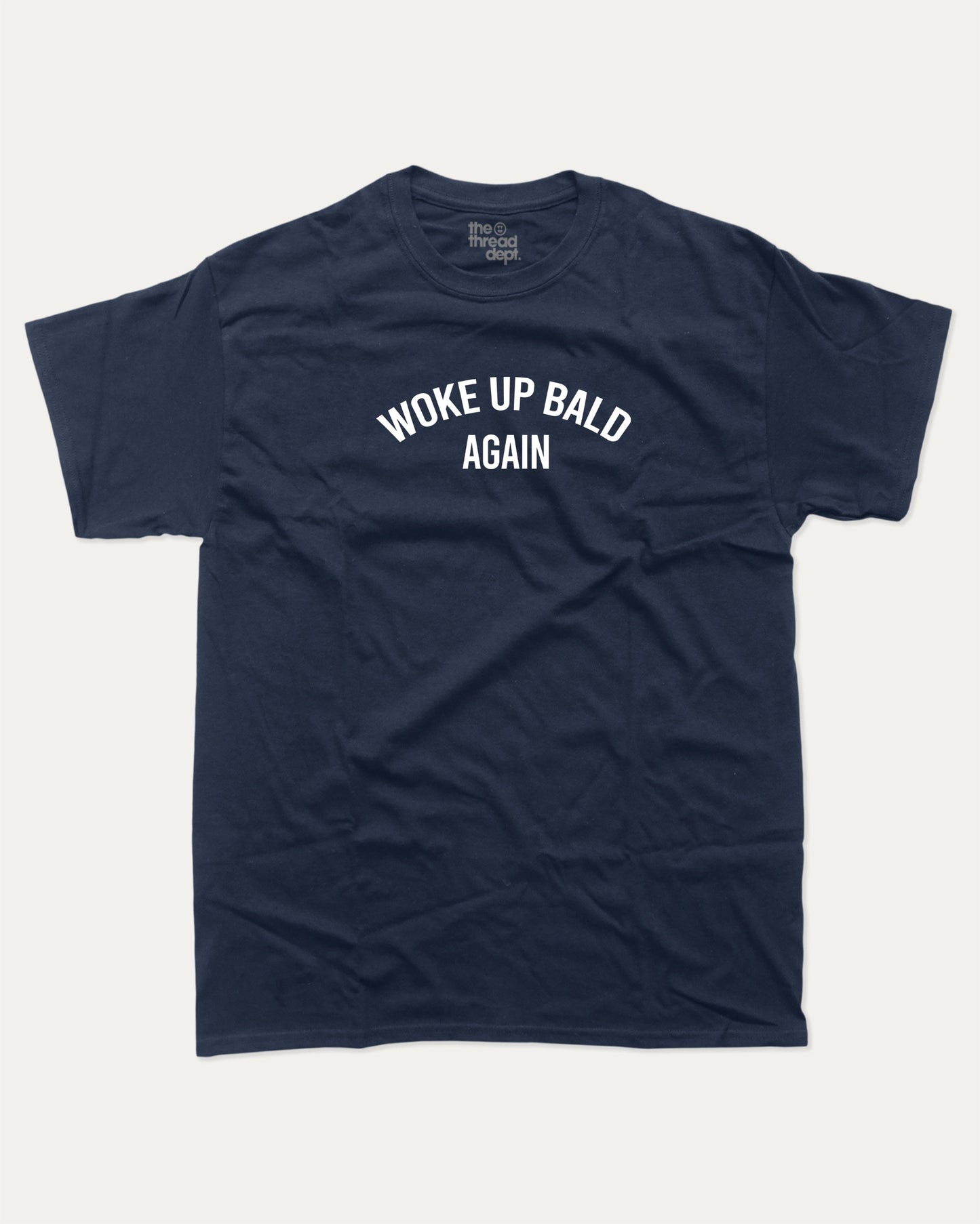 Woke Up Bald Again graphic tee with bold and humorous print, funny and trendy graphic. Perfect for adults and gift-giving. True Navy shirt.