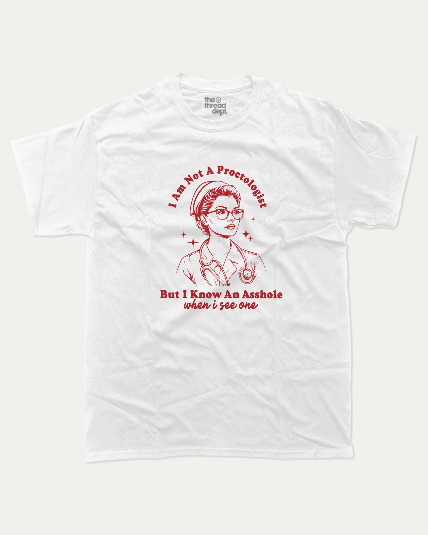 White t-shirt with I am not a Proctologist but I know asshole when I see one graphic and text on a white background