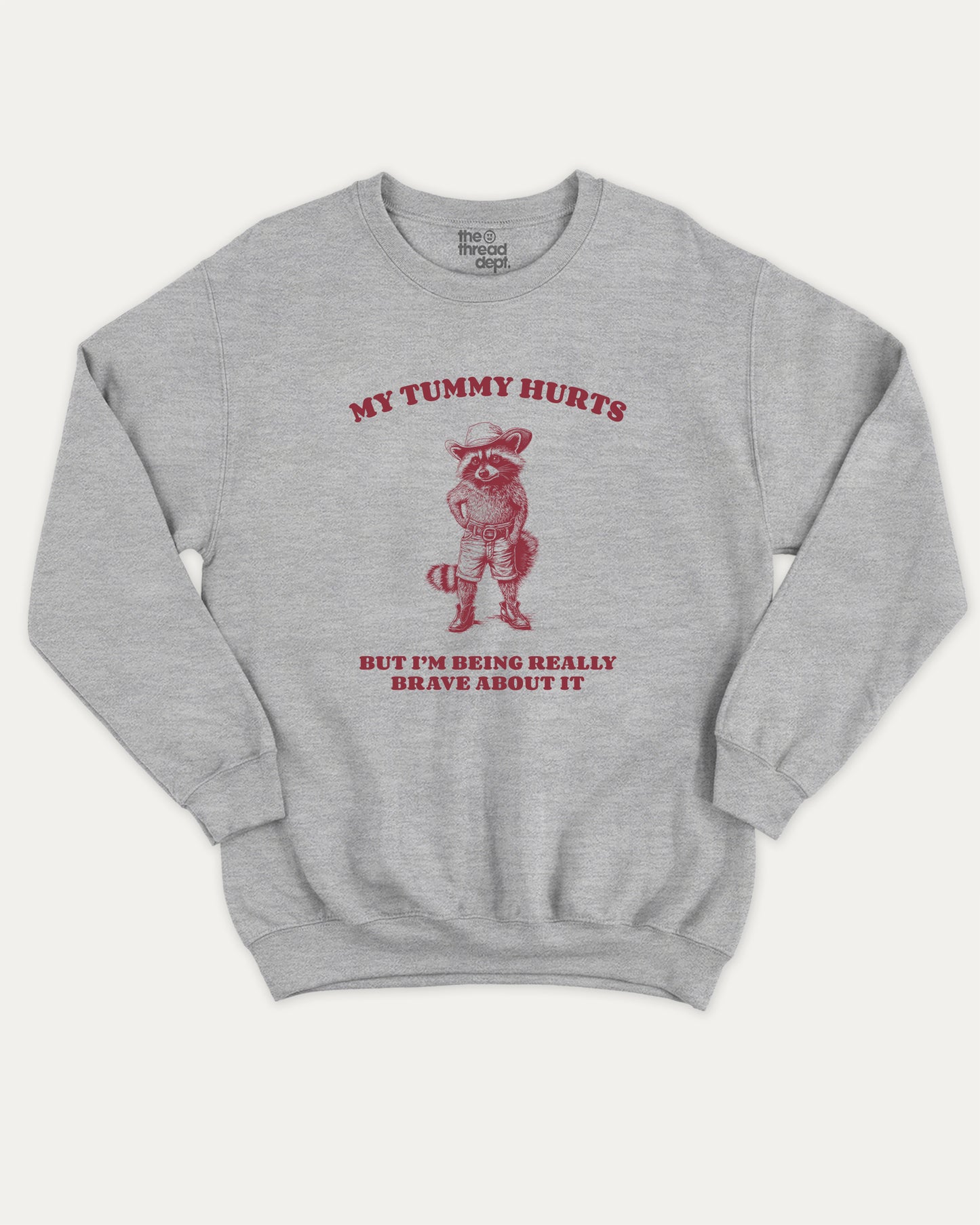 Gray sweatshirt with my tummy hurts but i'm being really brave about it graphic and text on a white background