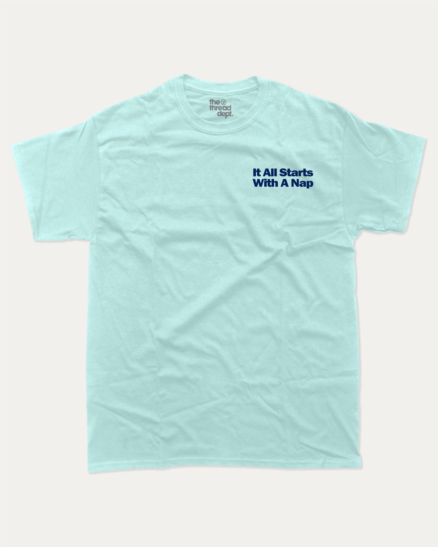 It All Starts With A Nap graphic tee with bold and humorous print, funny and trendy graphic. Retro Inspired Graphic T shirt, Perfect Gift for Nap Lover, Perfect for adults and gift-giving. Celadon shirt.