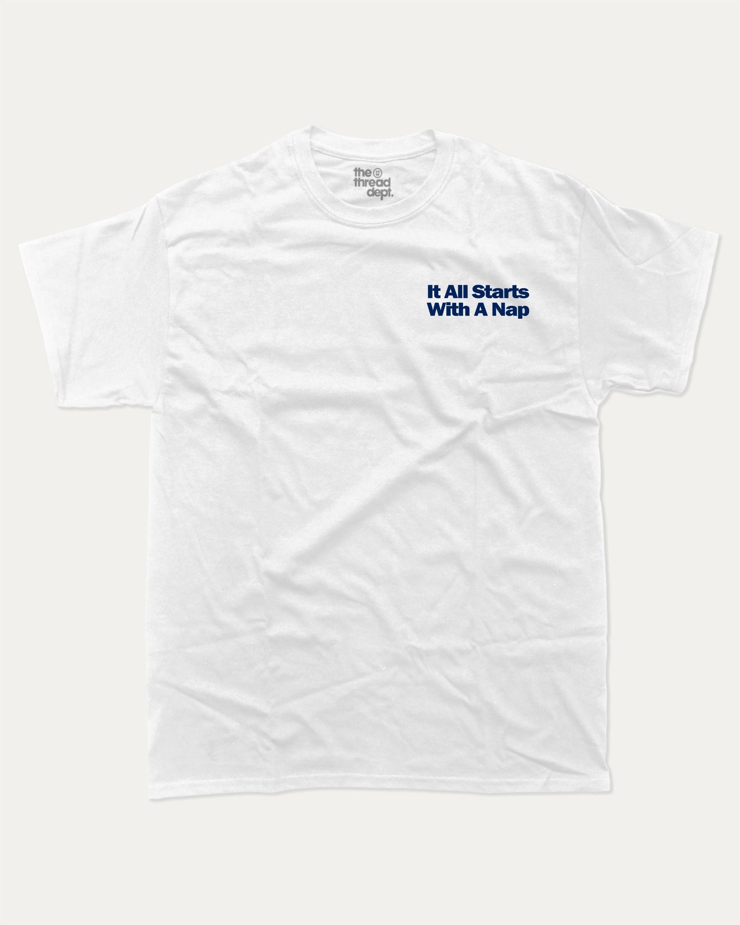 It All Starts With A Nap graphic tee with bold and humorous print, funny and trendy graphic. Retro Inspired Graphic T shirt, Perfect Gift for Nap Lover, Perfect for adults and gift-giving. White shirt.