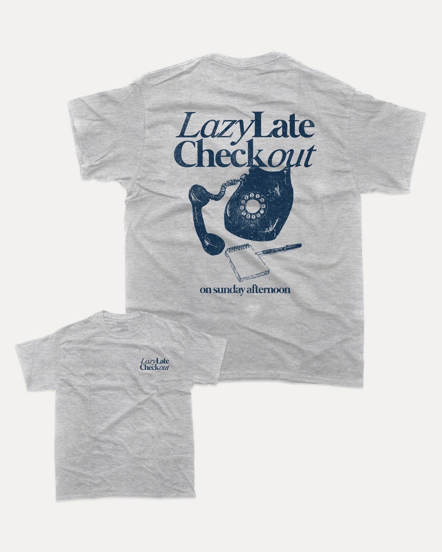 Lazy Late Check Out graphic tee with bold and humorous print, funny and trendy graphic. Retro Inspired Graphic T shirt, Vintage Inspired Graphic T shirt, Perfect for adults and gift-giving. Heather Grey shirt.