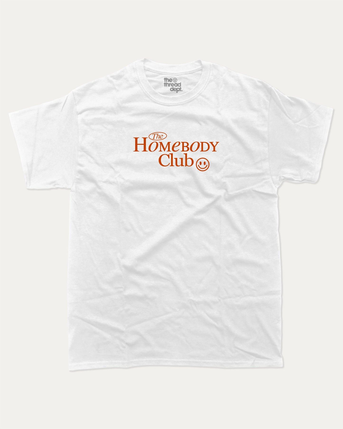 The Homebody Club graphic tee with bold and humorous print, funny and trendy graphic. Vintage Inspired Graphic t shirt, Retro Inspired Graphic T shirt, Perfect for adults and gift-giving. White shirt.