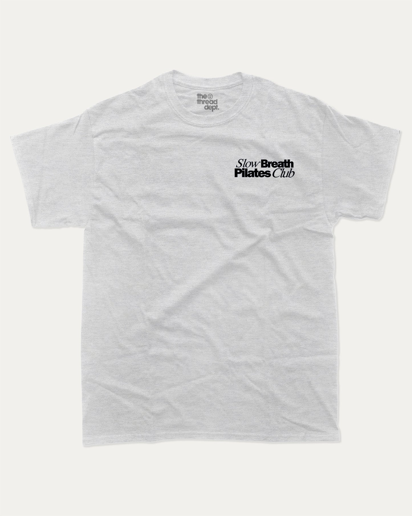 Slow Breath Pilates Club graphic tee with bold and humorous print, Pilates Graphic tee, Excercise Graphic tee, Workout t shirt, Perfect Gift for fit people, funny and trendy graphic. Perfect for adults and gift-giving. Ash Grey shirt.