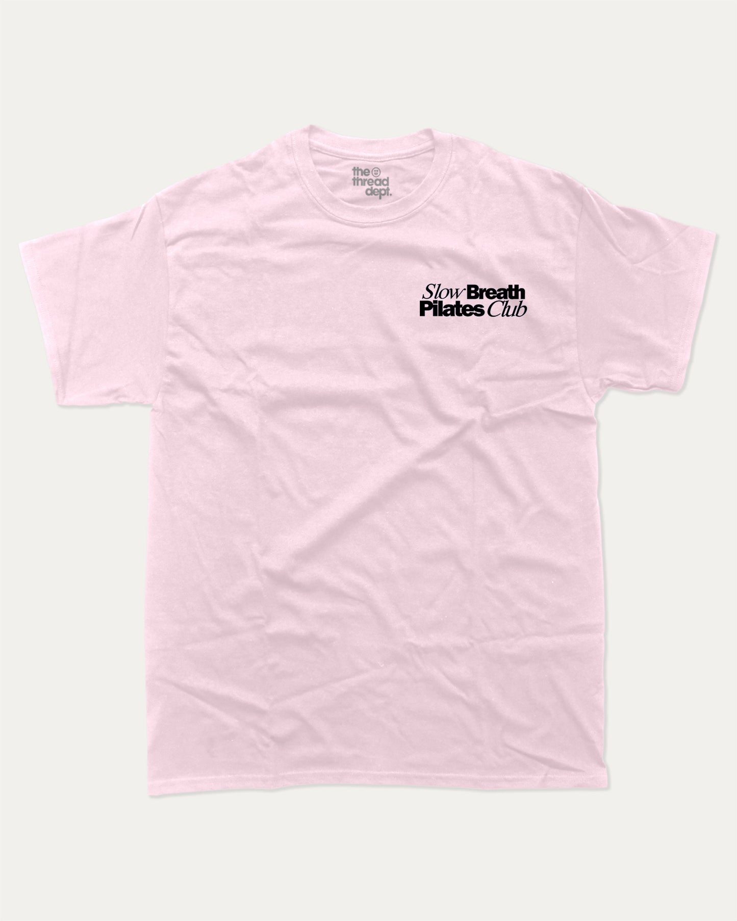 Slow Breath Pilates Club graphic tee with bold and humorous print, Pilates Graphic tee, Excercise Graphic tee, Workout t shirt, Perfect Gift for fit people, funny and trendy graphic. Perfect for adults and gift-giving. Pink shirt.