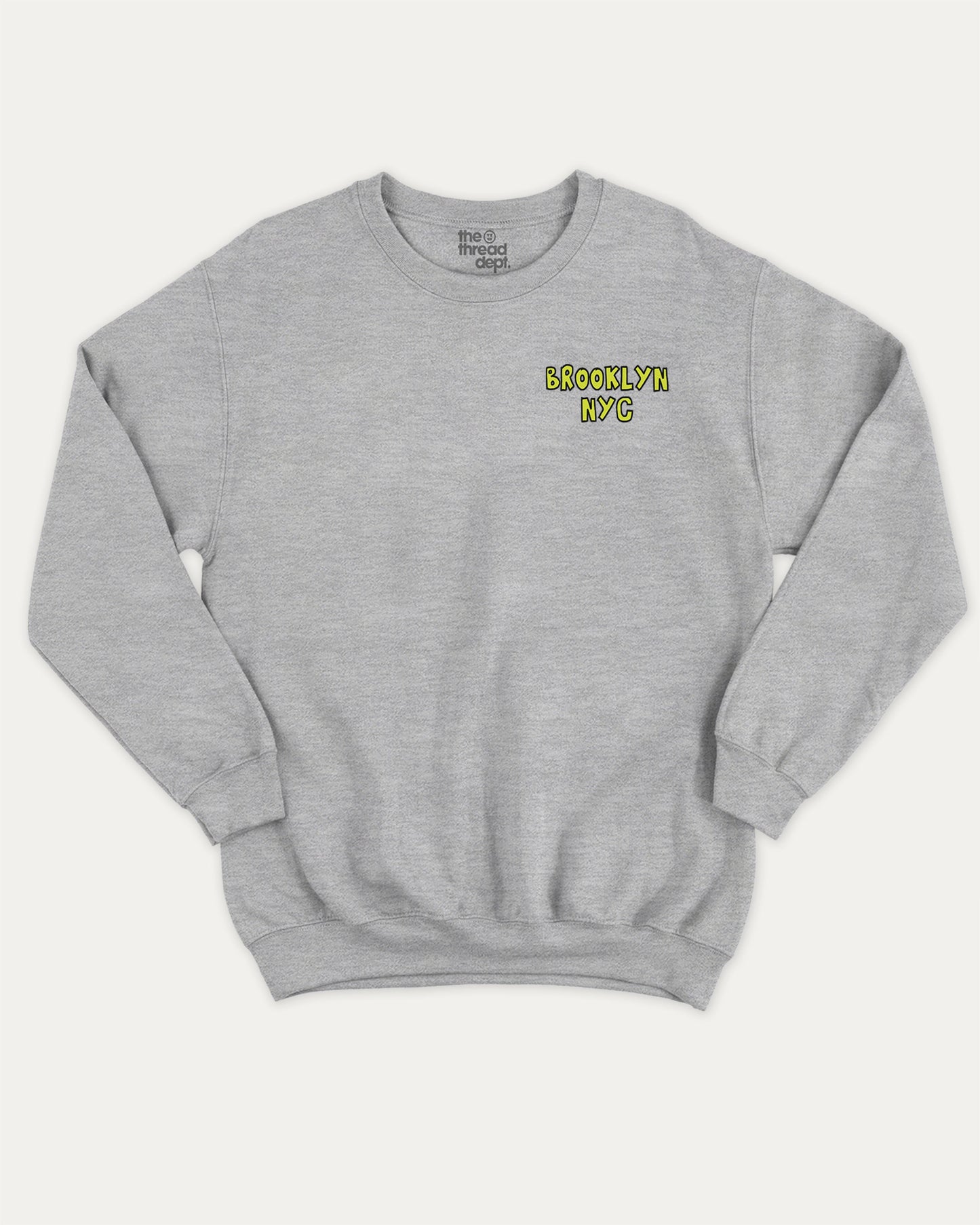 Brooklyn graphic sweatshirt with bold and humorous print, warm and cozy graphic for everyday wear. New York City Graphic Pull Over, State Graphic Pull Over Perfect for adults and gift-giving. Heather Grey pullover.