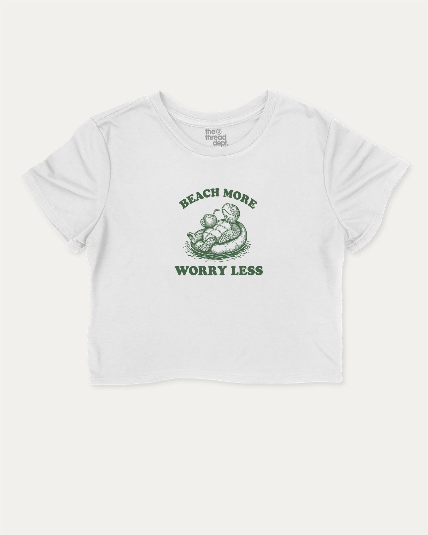 Beach More Worry Less cute and trendy crop tee with nostalgic graphic, perfect for women. A must-have cropped summer shirt, ideal for daily outfits and casual days. White crop tee
