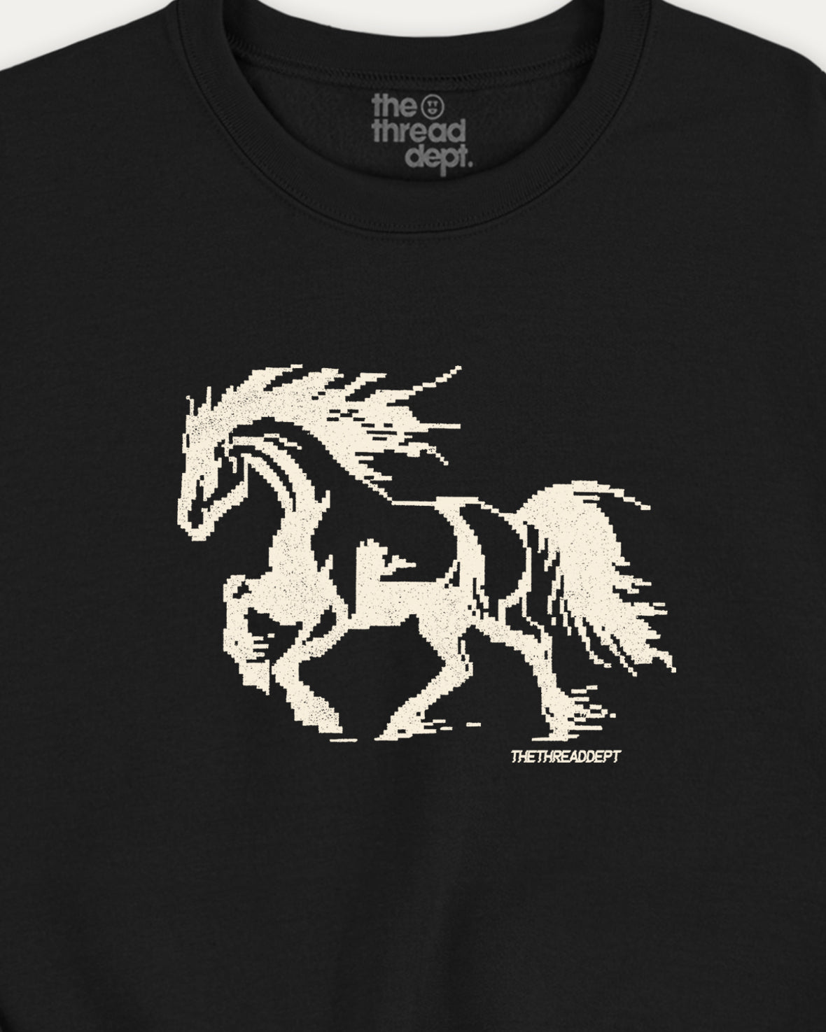 Black t-shirt with a white horse graphic and 'the thread dept.' branding.