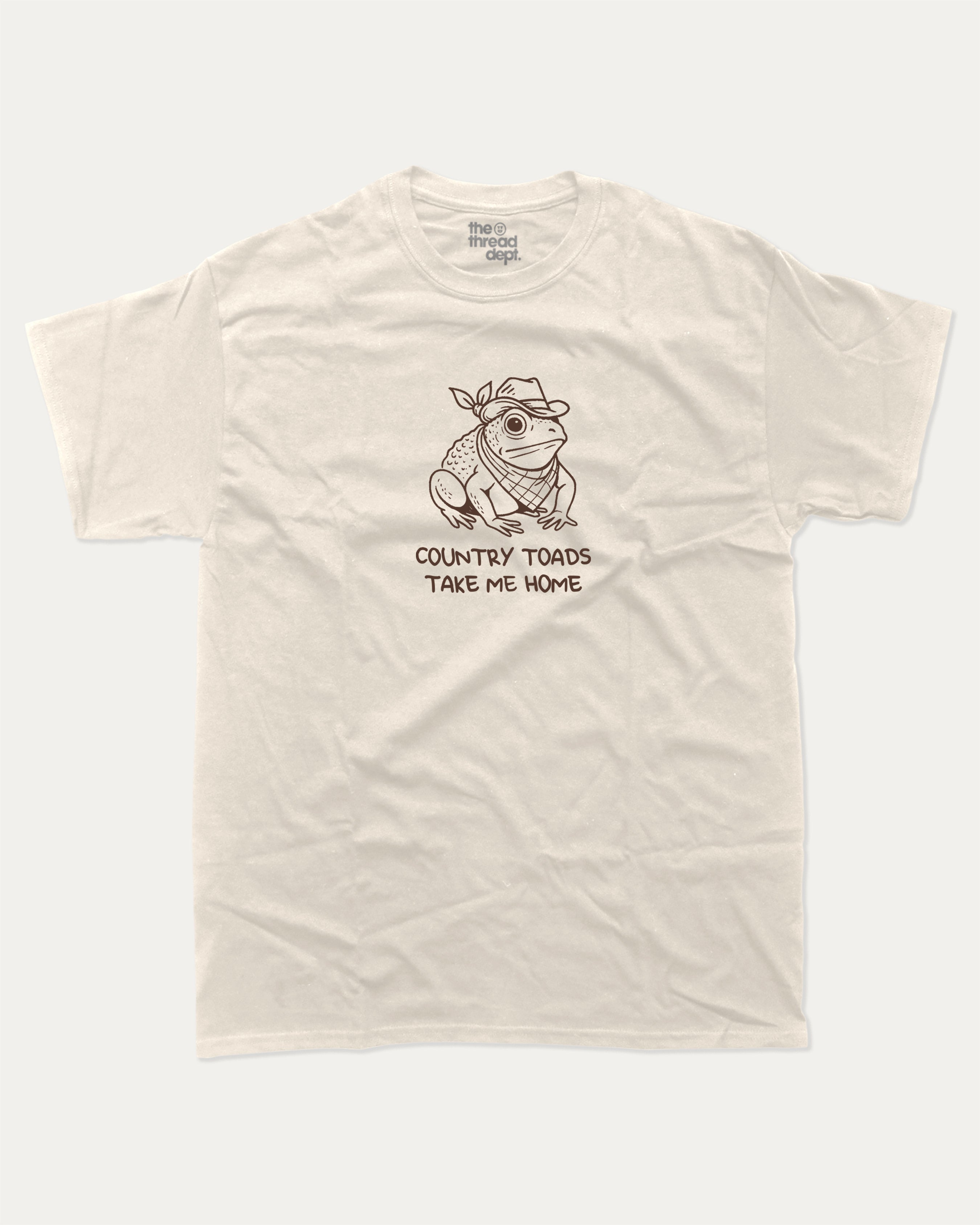 Country Toads Take Me Home funny frog graphic tee with retro and funny print, vintage and trendy graphic. Perfect funny gifts for friends and gift-giving. Cream shirt.