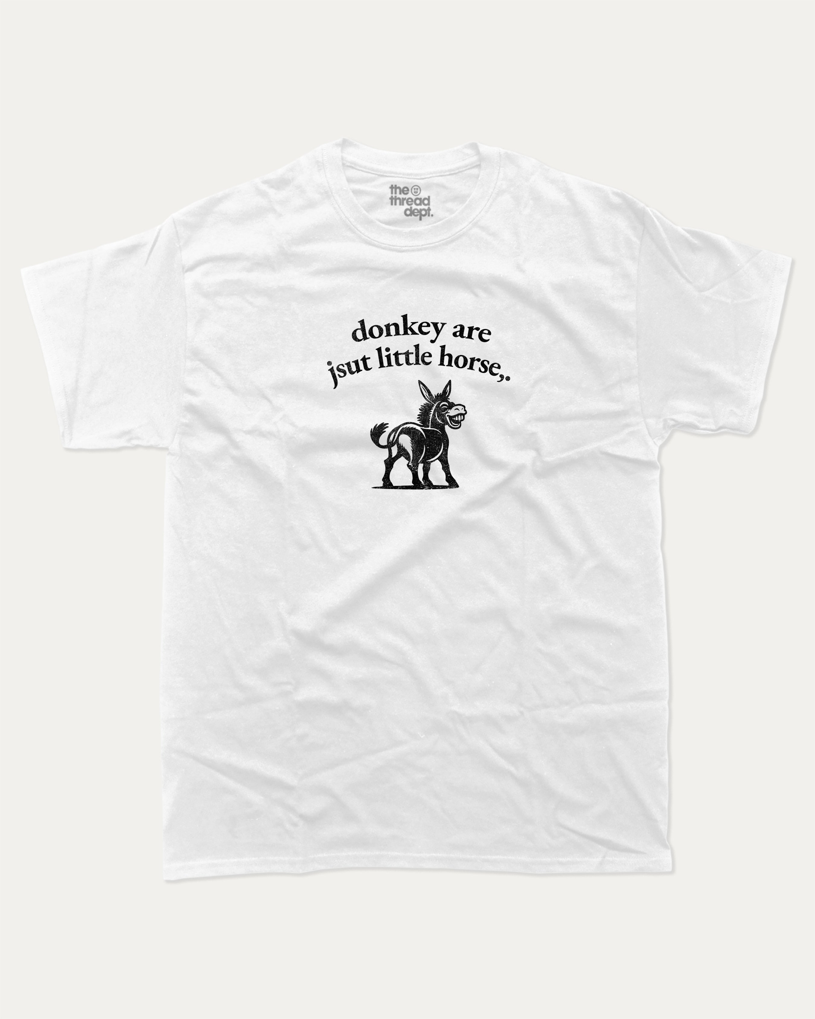 donkey are jsut little horse graphic tee with bold and humorous print, funny and trendy graphic. Perfect for adults and gift-giving. White shirt.