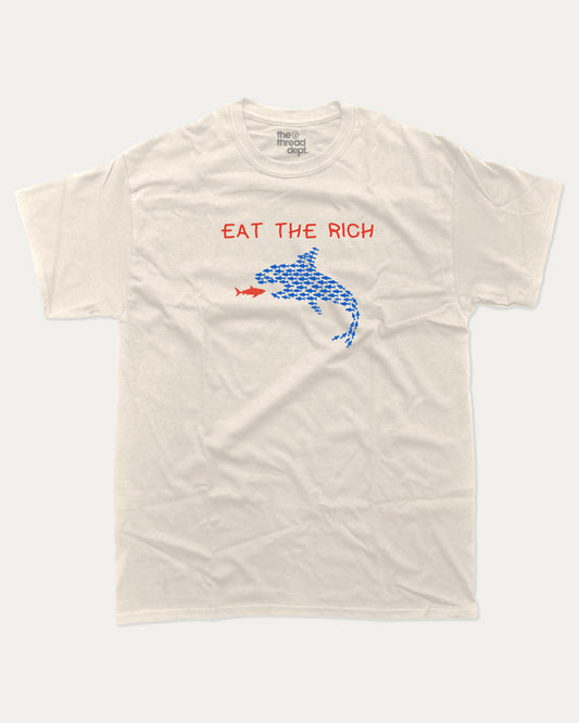 EAT THE RICH graphic tee with bold and humorous print, funny and trendy graphic. Funny Shark Graphic Tee, Funny meme T shirt,  Perfect for adults and gift-giving. Cream shirt.
