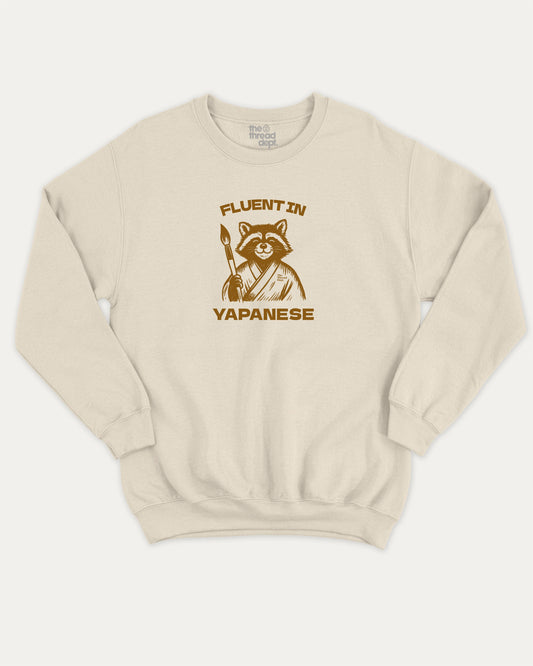 Fluent In Yapanese Racoon pullover sweatshirt, perfect funny gift for friends. Yapping quotes meme graphic pullover, comfy cold-weather wear, bold casual look. Natural sweater