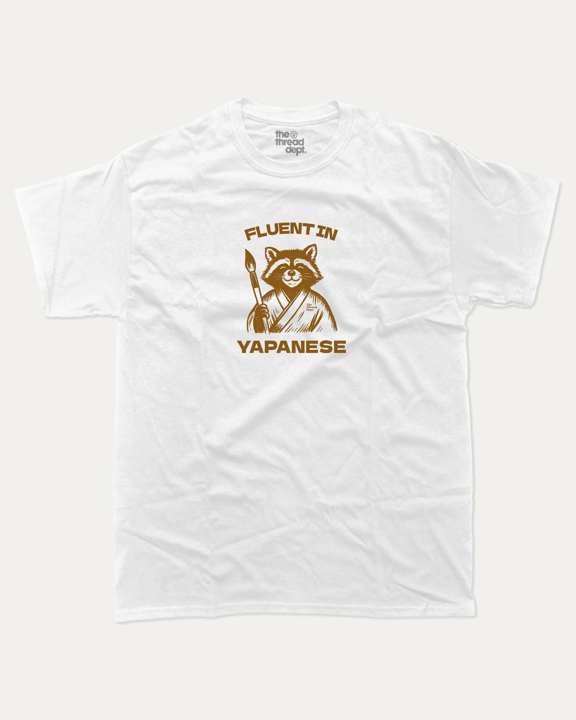 Fluent In Yapanese Racoon graphic t-shirt, perfect funny gift for friends. A must-have animal tee, yapping quotes meme shirt, unique gift idea. White.
