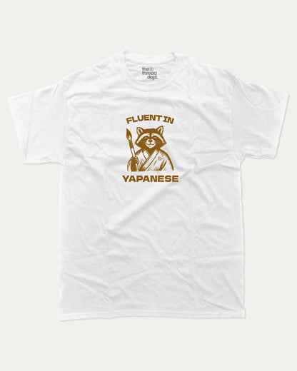 Fluent In Yapanese Racoon graphic t-shirt, perfect funny gift for friends. A must-have animal tee, yapping quotes meme shirt, unique gift idea. White.