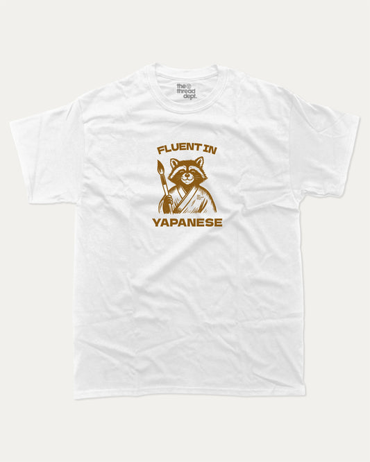 Fluent In Yapanese Racoon graphic t-shirt, perfect funny gift for friends. A must-have animal tee, yapping quotes meme shirt, unique gift idea. White.