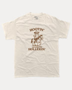 Hootin Leads to Hollerin Owl graphic tee with bold and humorous print, Funny meme Graphic T shirt, funny and trendy graphic. Perfect for adults and gift-giving. Cream shirt.