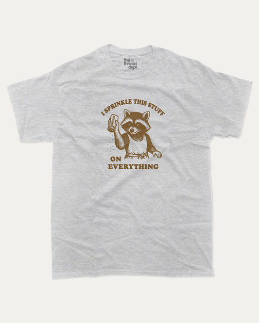 I Sprinkle This Stuff On Everything graphic t-shirt, perfect for adults. Funny Sarcasm tee, trending meme shirt, unique gift idea. Ash Grey .