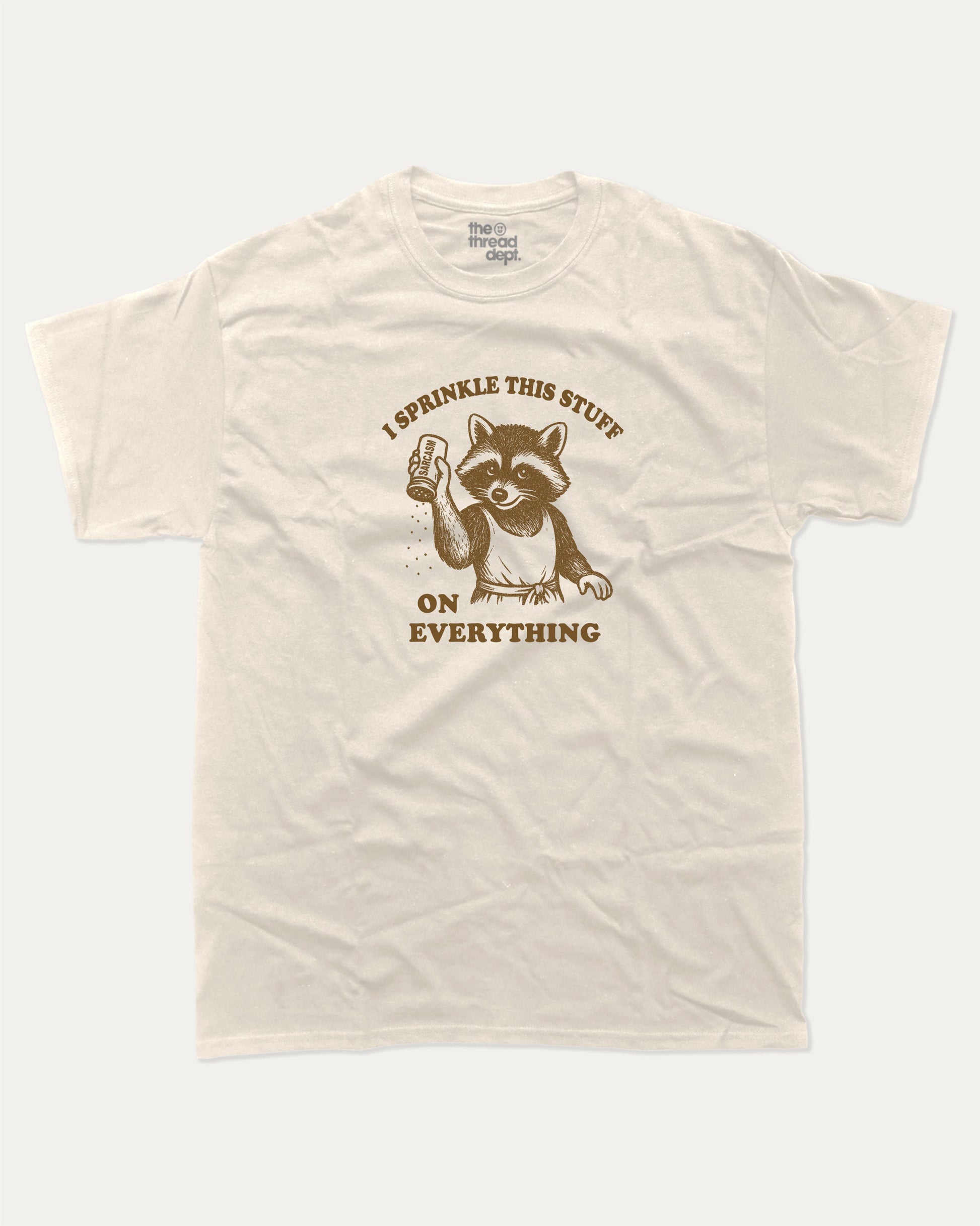 I Sprinkle This Stuff On Everything graphic t-shirt, perfect for adults. Funny Sarcasm tee, trending meme shirt, unique gift idea. Cream.