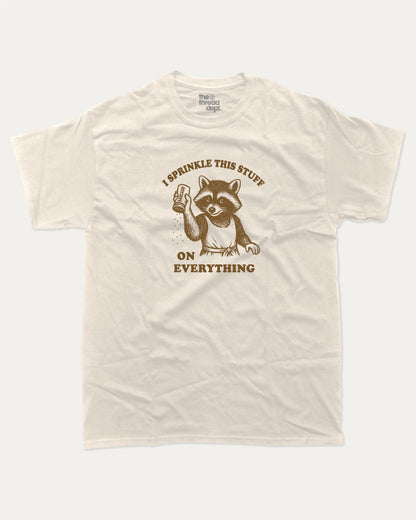 I Sprinkle This Stuff On Everything graphic t-shirt, perfect for adults. Funny Sarcasm tee, trending meme shirt, unique gift idea. Cream.
