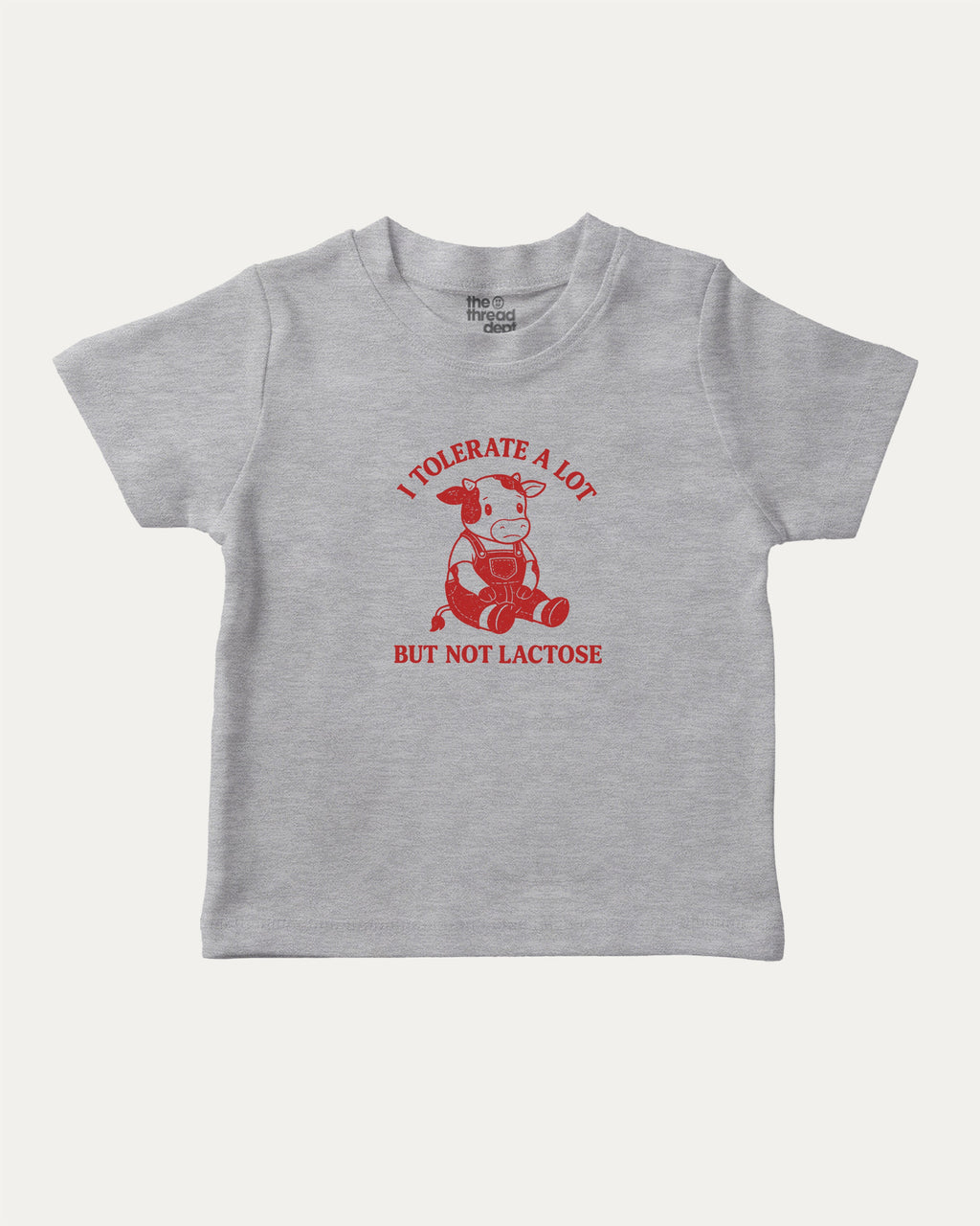 I Tolerate A Lot But Not Lactose graphic tee with cute cow print, funny and trendy graphic. Perfect for adults and gift-giving. Heather Grey shirt.